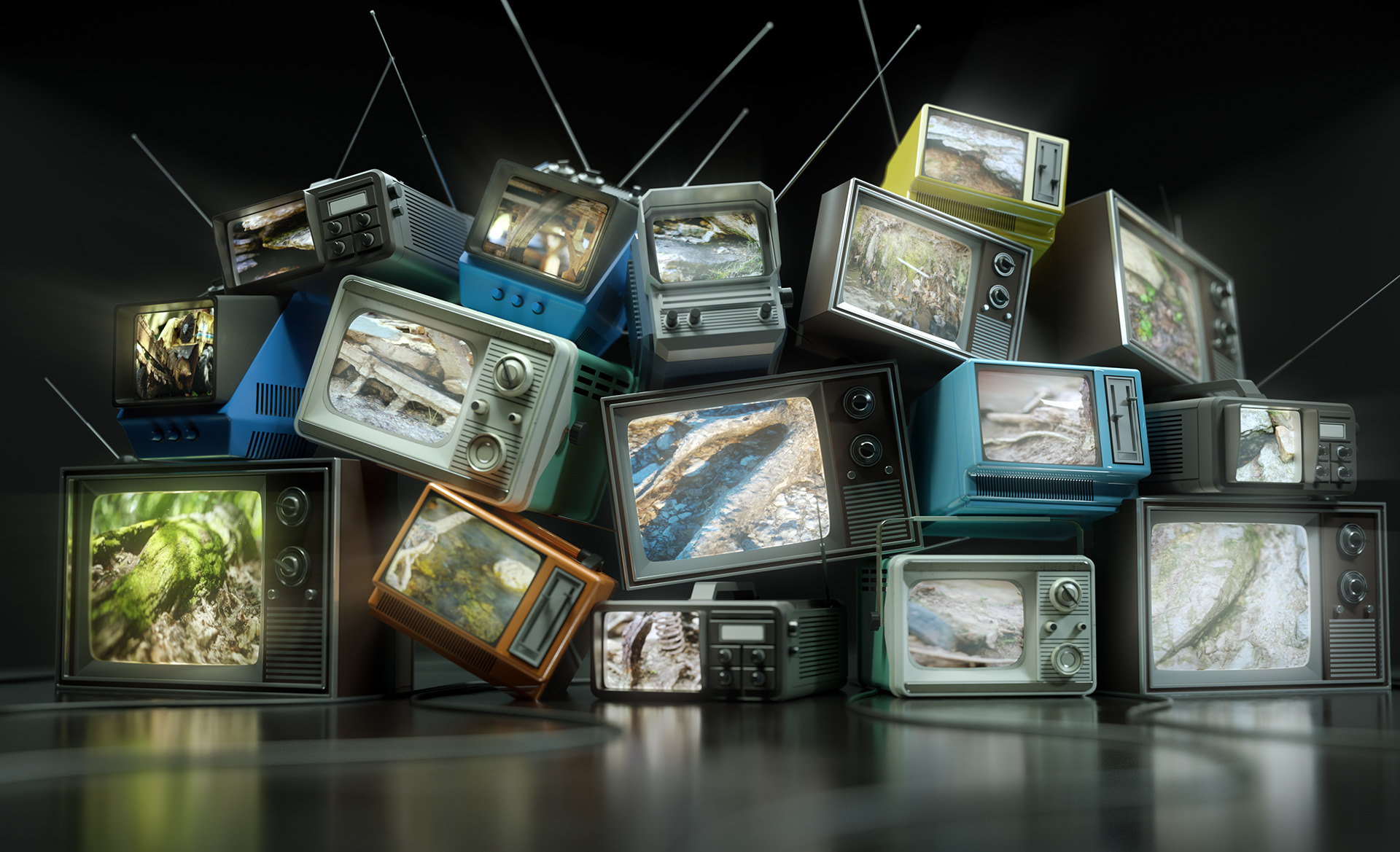 Stacked televisions showing my photogrammetry renders.