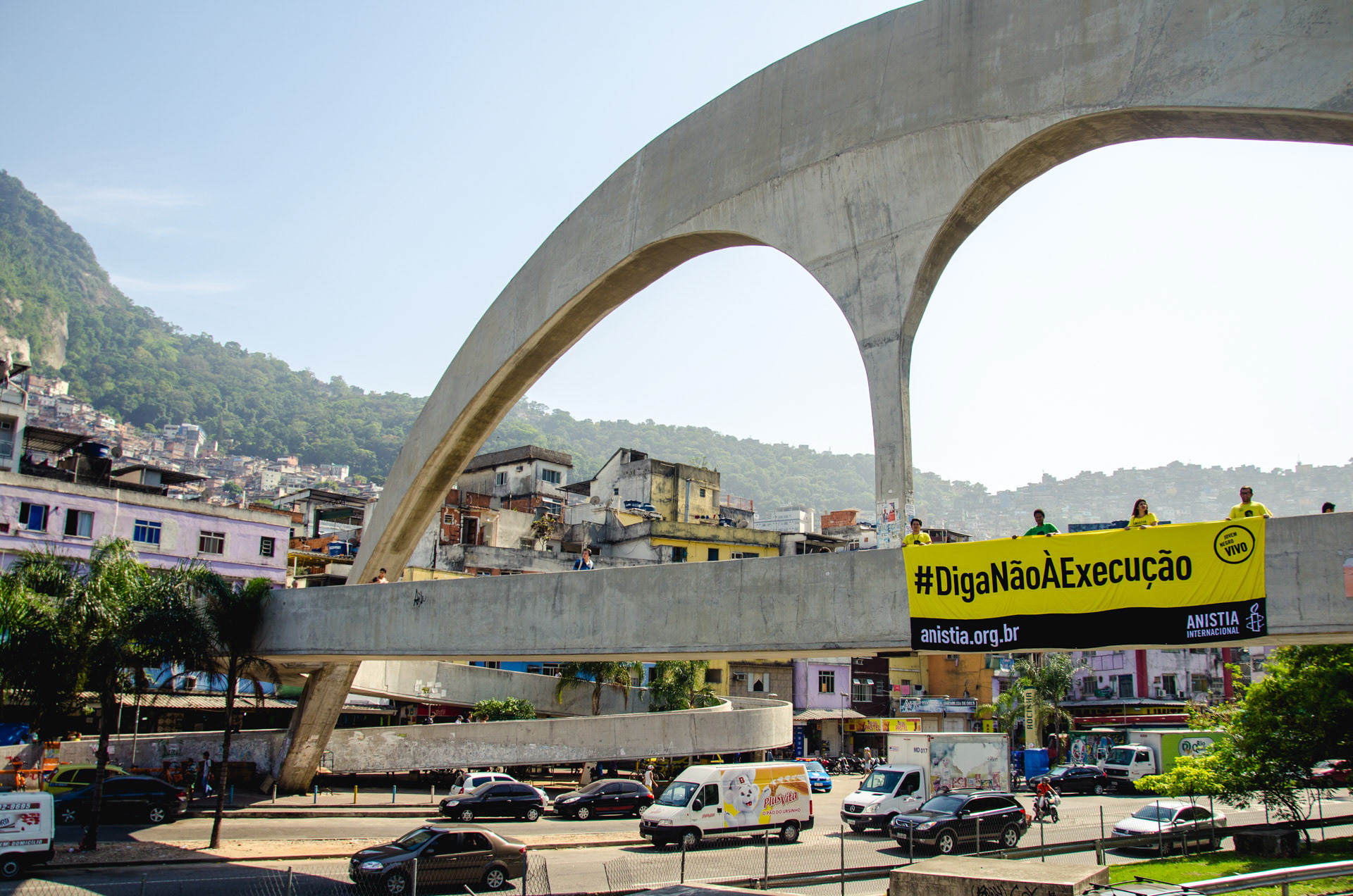 Activists hold a sign 'Say No To Execution' at the entrance of the Rocinha favela, the largest one in Rio de Janeiro and Brazil - Oct 2015