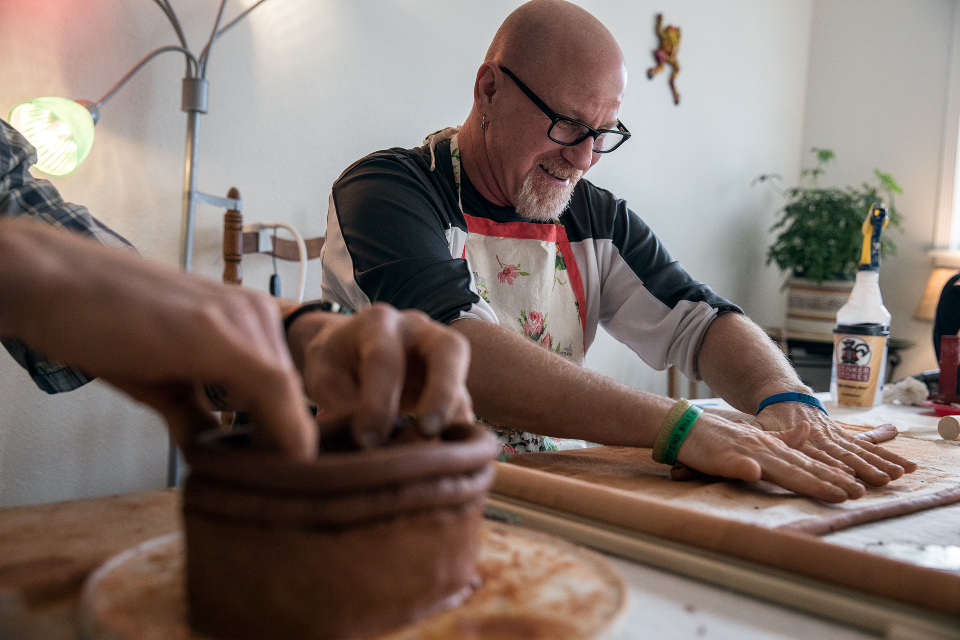 William Ahkrum joins other veterans for ceramics in the morning on Thursday at the Veteran's Wellness Center, Jan. 3, in Boise. The center provides artistic outlets for veterans suffering from PTSD.