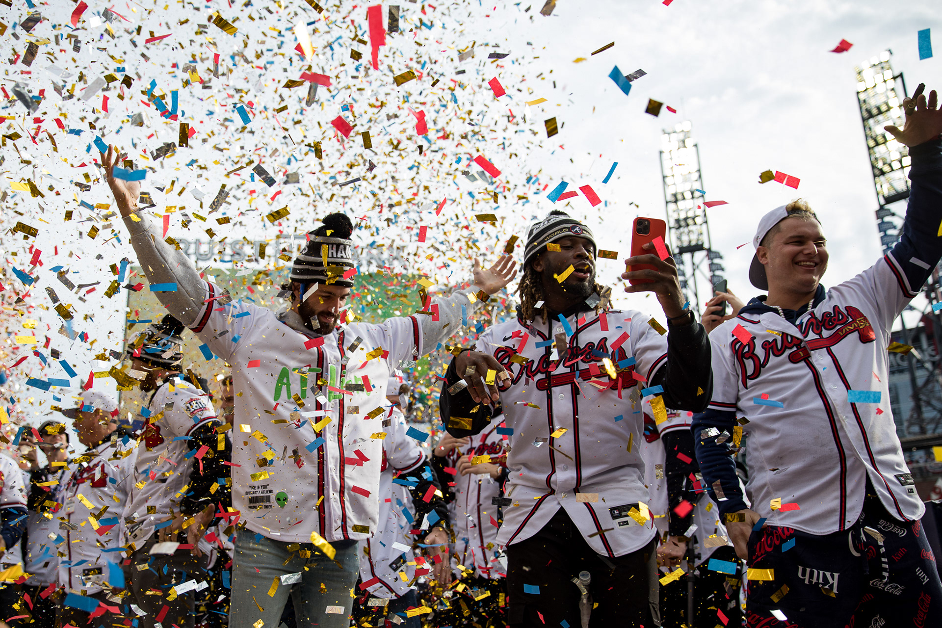 Players on the Atlanta Braves celebrate the team's World Series victory in a shroud of confetti.