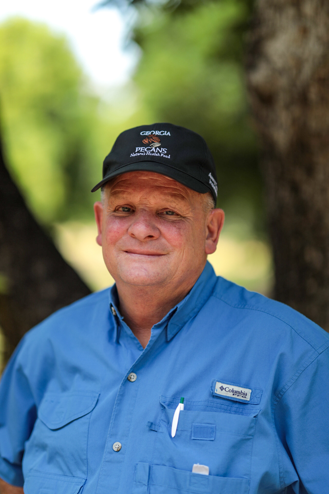 Miley Adams, president of the Georgia Pecan Growers Association, stands for a portrait on his 1,500 acre farm in Camilla on July 13.