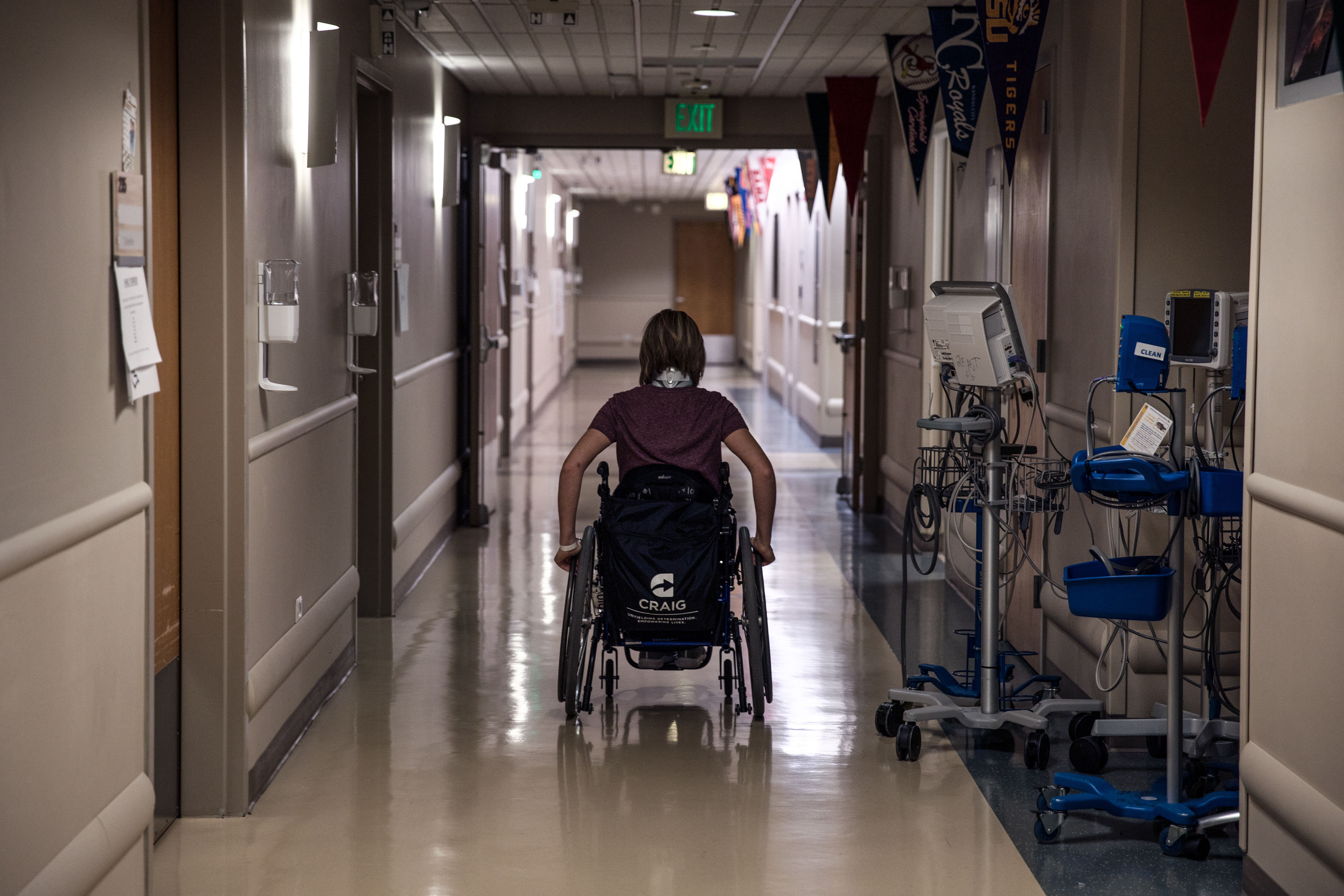 Nikeela Black speeds down a hallway at Craig Hospital in Englewood, Colo., on Oct. 17.