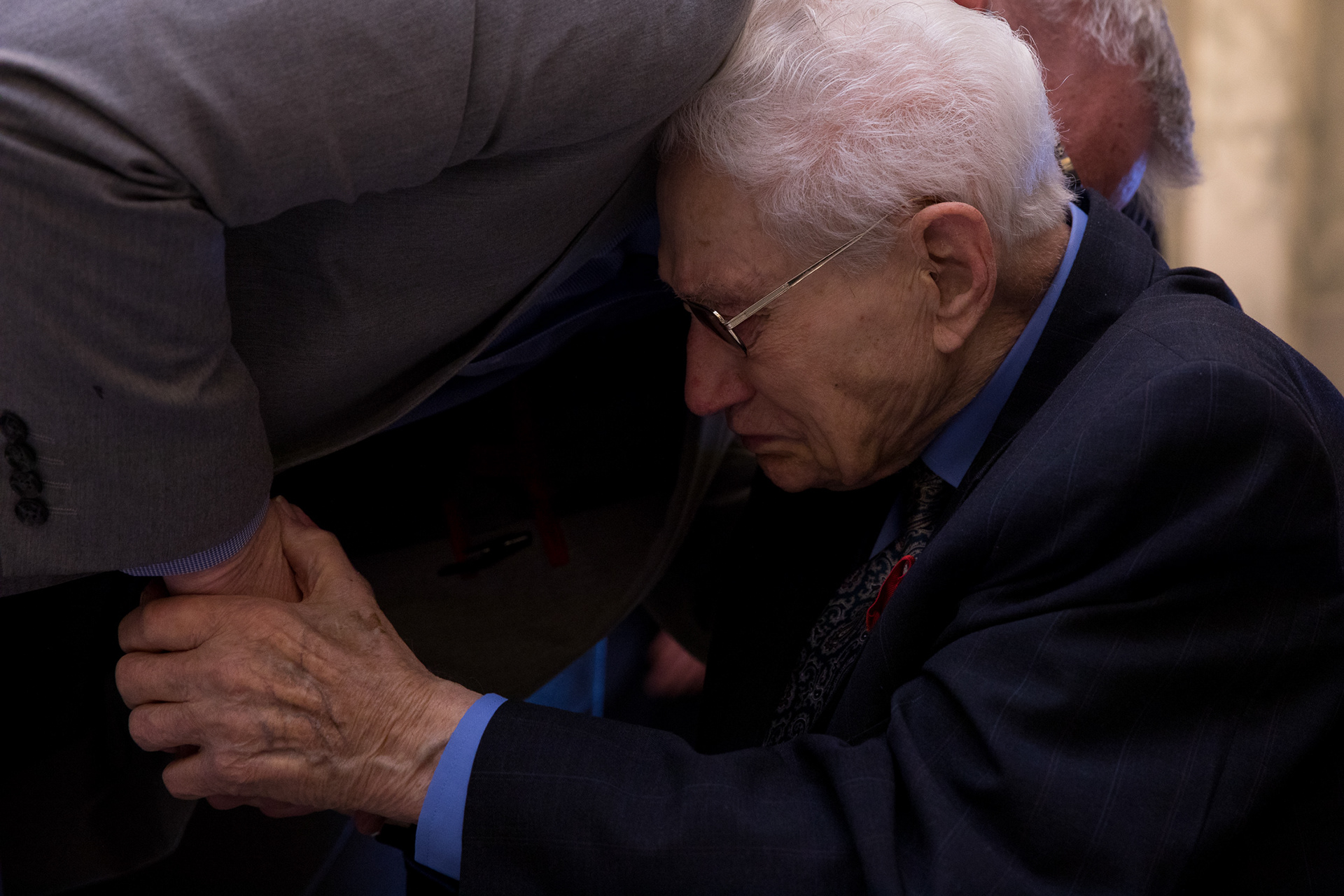 Emil Reich, WWII veteran, shares emotional encounters with individuals shaking his hand after he was awarded the Legion of Honor on Feb. 22 in Boise.