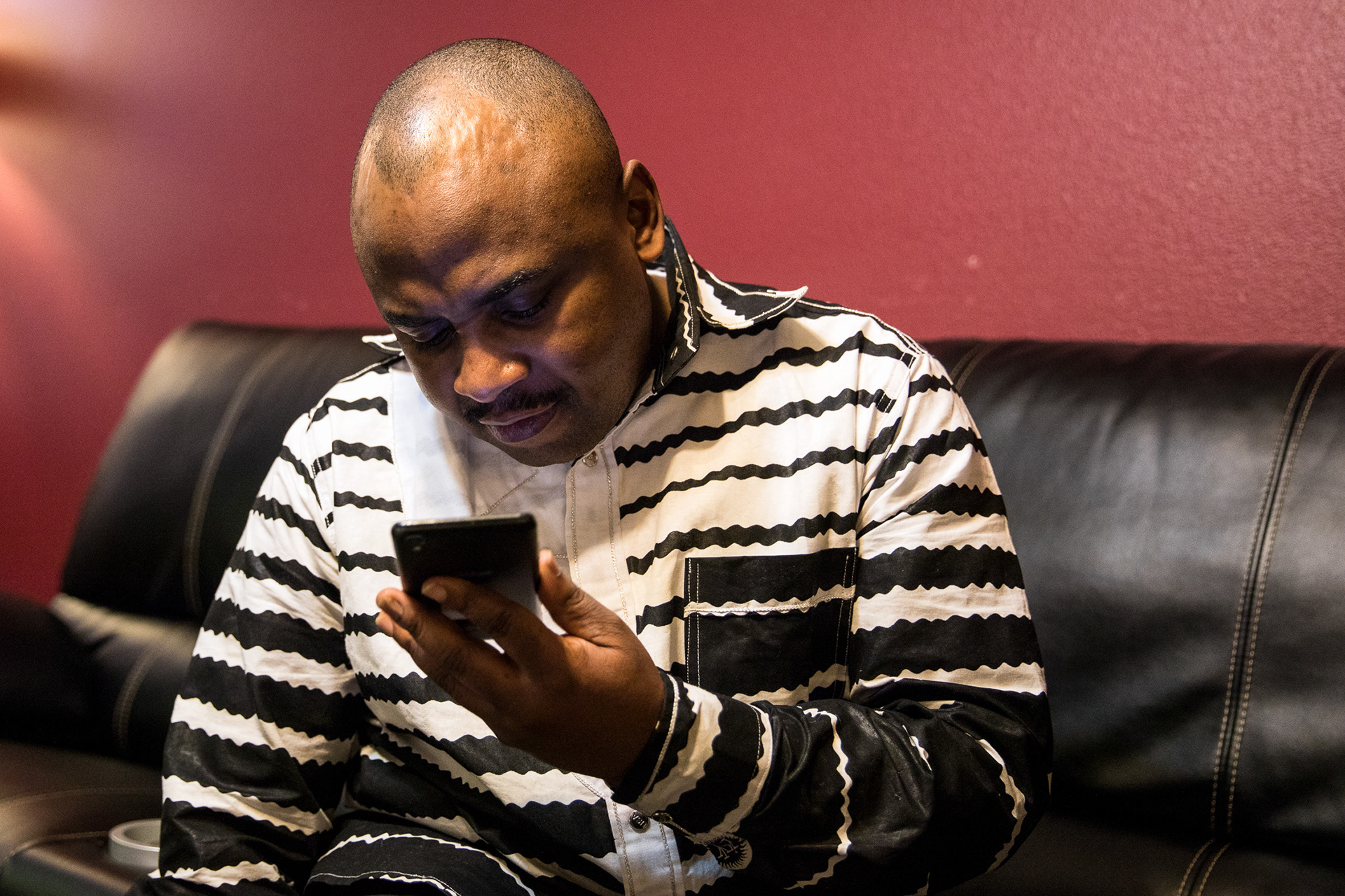 Hagath Mwamaba talks to his daughter Ornelie, 18, who has been living alone in the Tongogara refugee camp near Chipinge, Zimbabwe, on Feb. 6 in Boise.