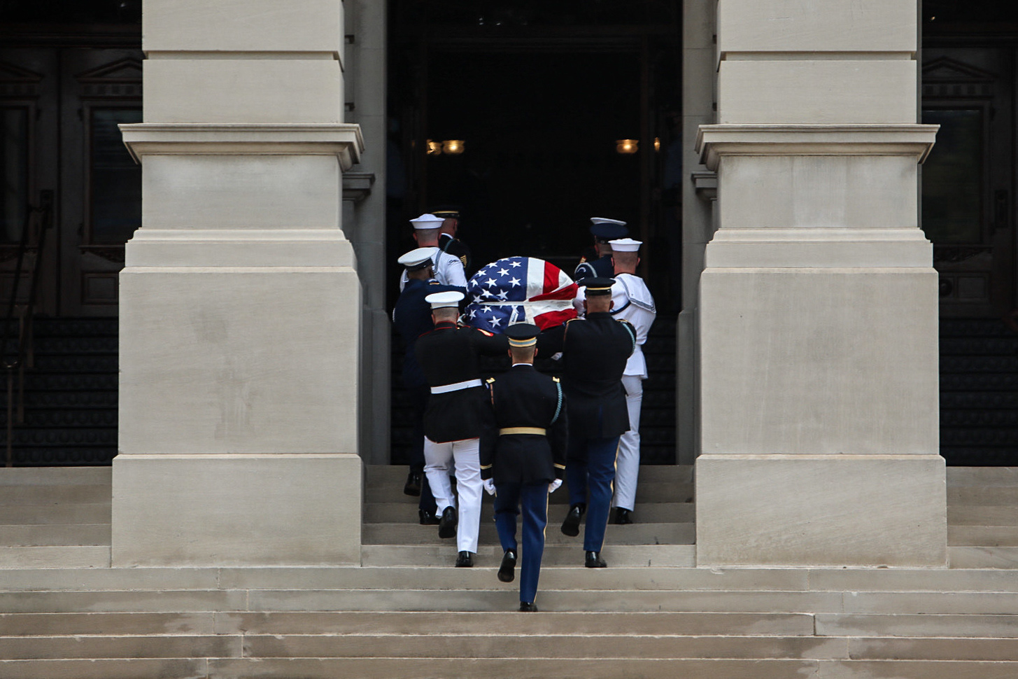 The casket carrying Georgia Congressman John Lewis makes its way into the Georgia State Capitol Building to lie in the rotunda on July 29 in Atlanta.