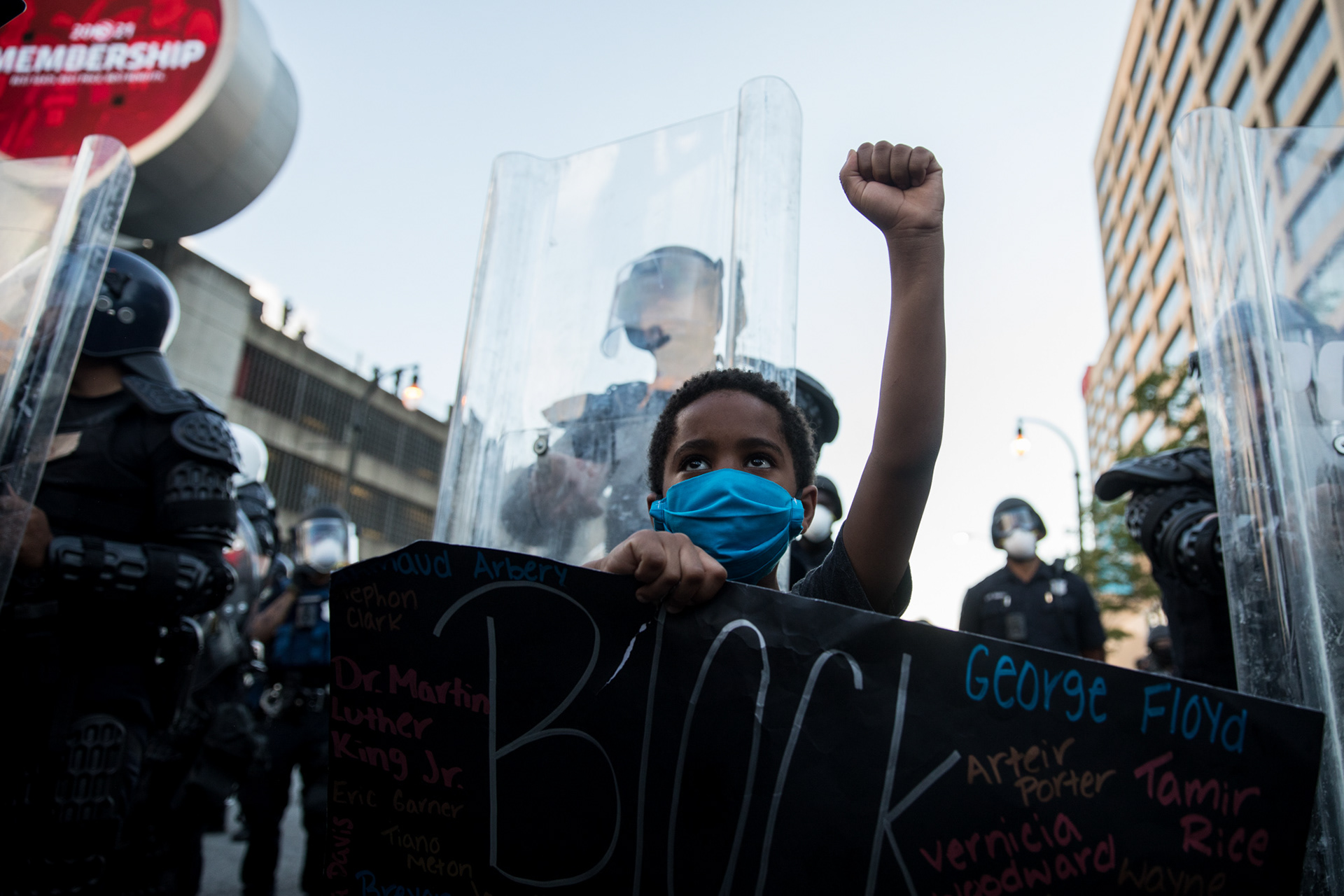 A young protester stands in front of the police line in downtown Atlanta on May 31.
