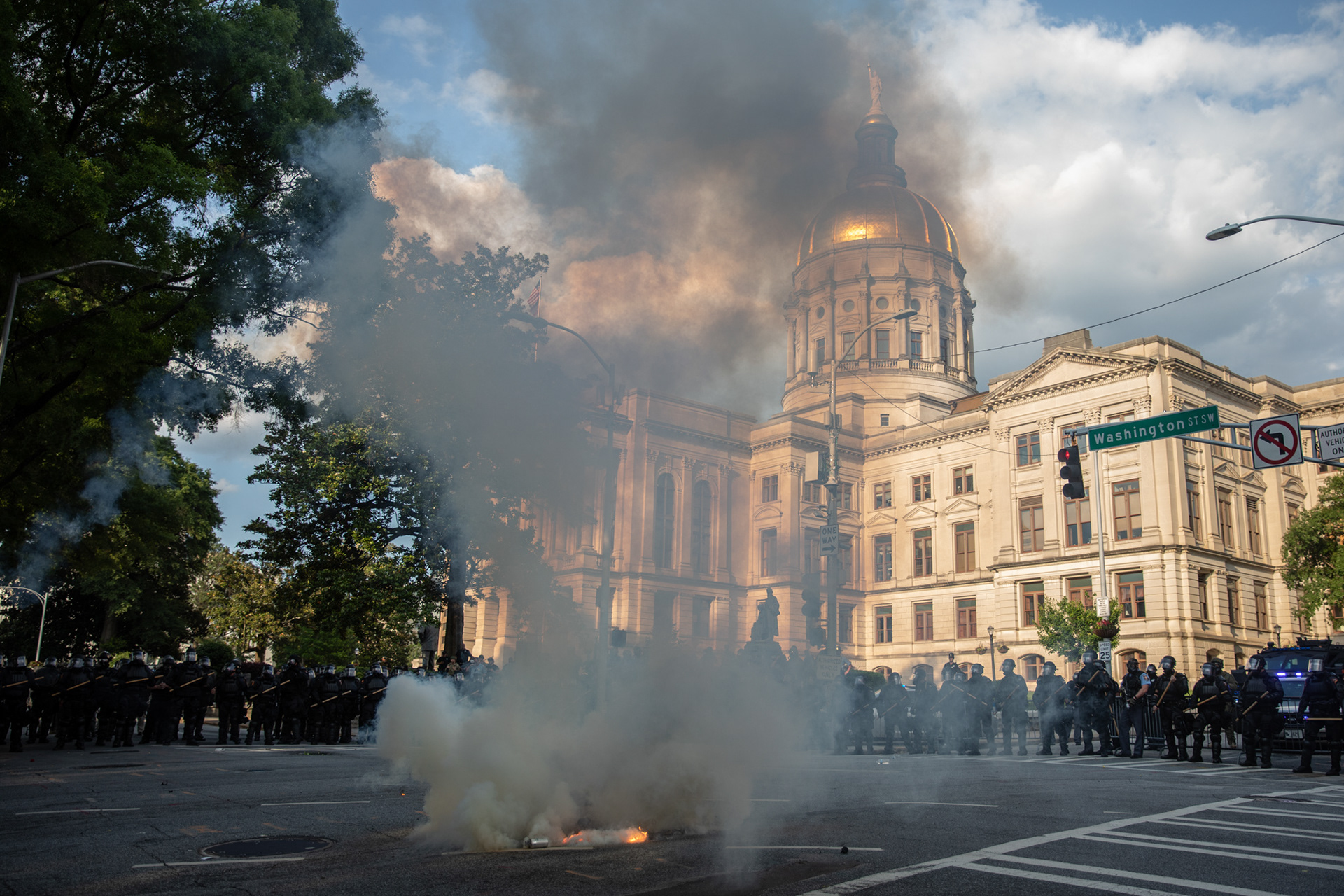 A cloud of tear gas billows in front of the Georgia State Capitol building on June 2 in Atlanta.