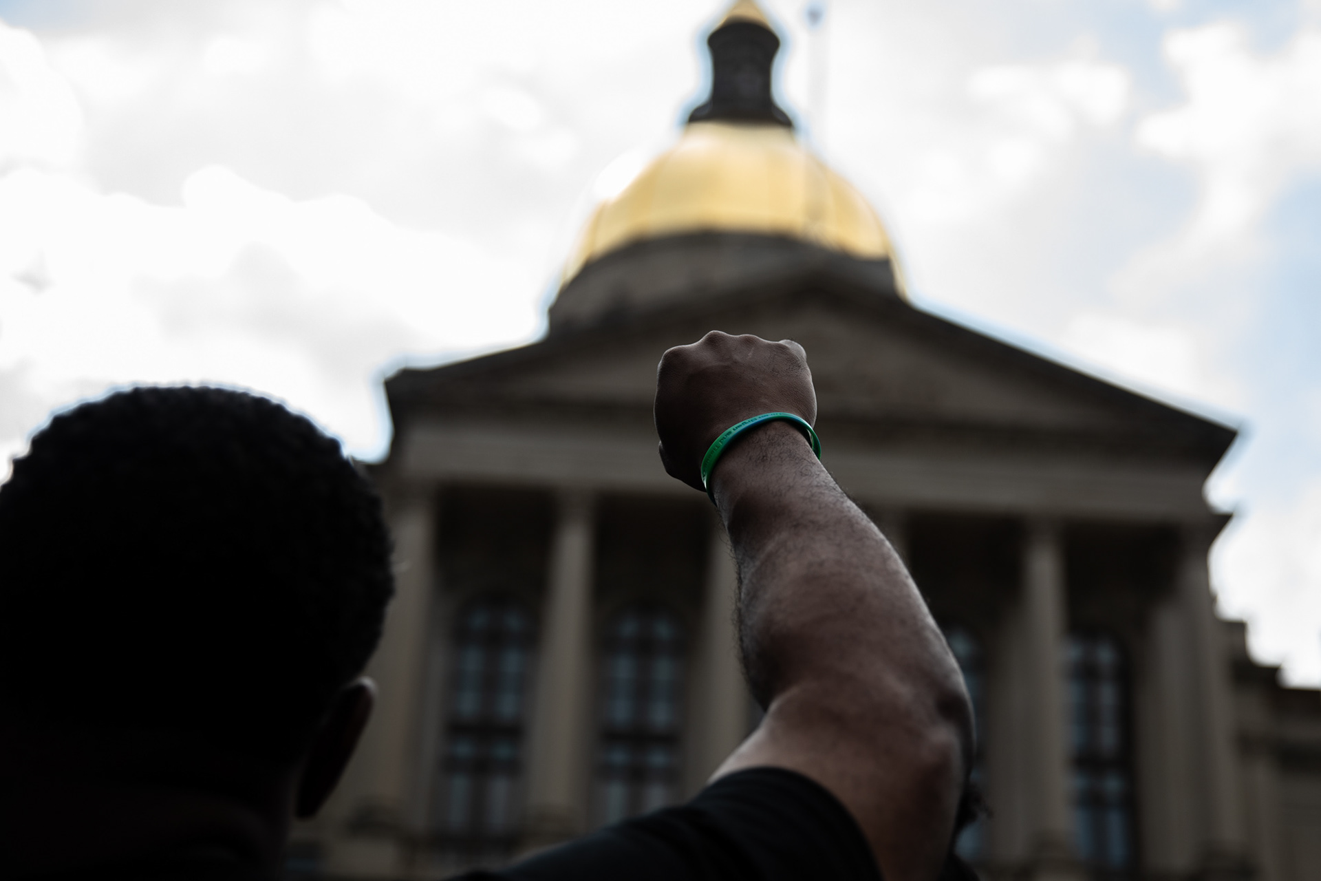 Protesters called for lawmakers to repeal the citizen’s arrest law, expand voting rights for nonviolent felony offenders, amend the state’s stand-your-ground laws and reject an elections bill as the General Assembly reconvenes after hiatus on June 15.