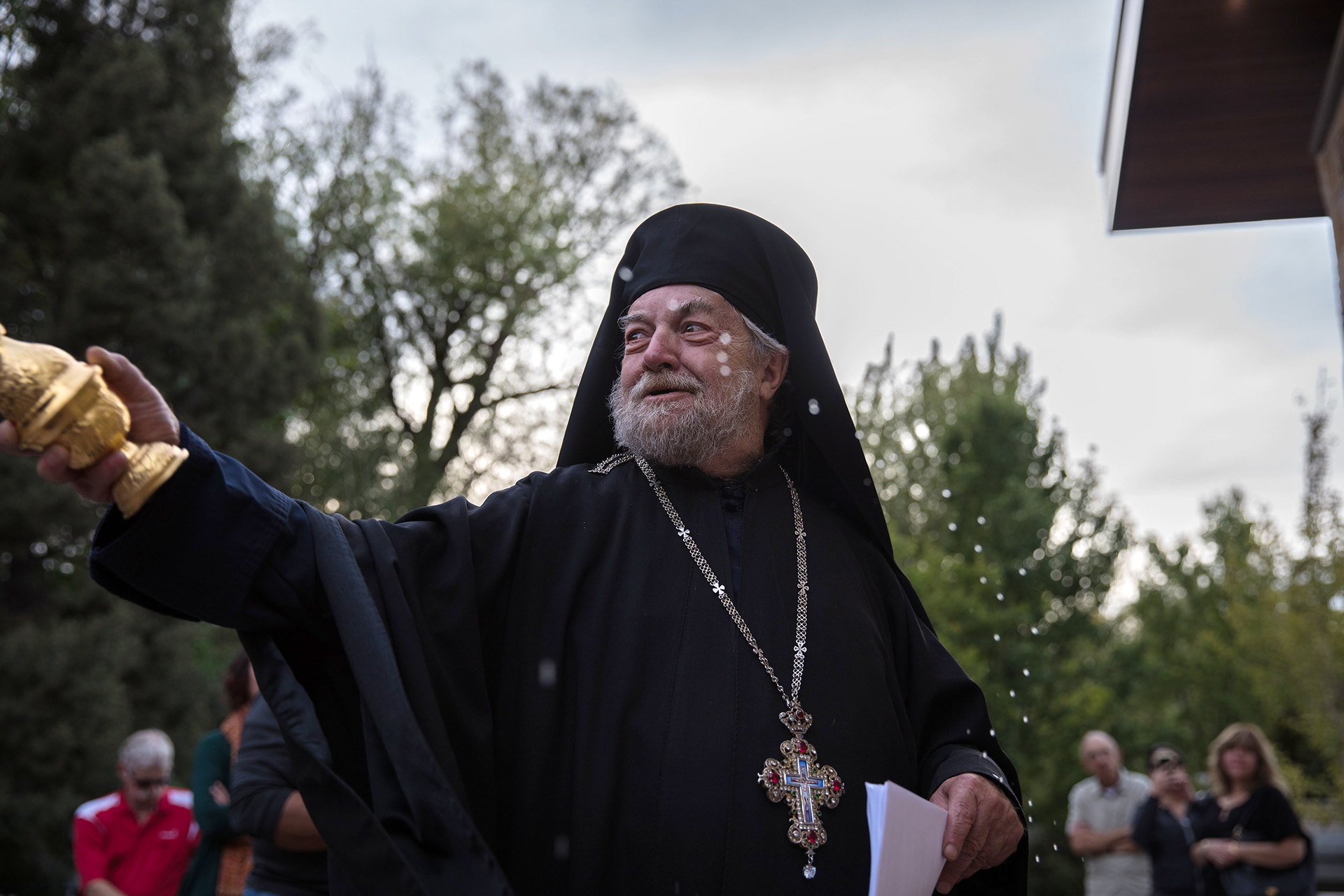 Father Nektarios Serfes from the Greek Orthodox Church blesses the crowd at the new Armenian Genocide Memorial in Boise on Sept. 21.