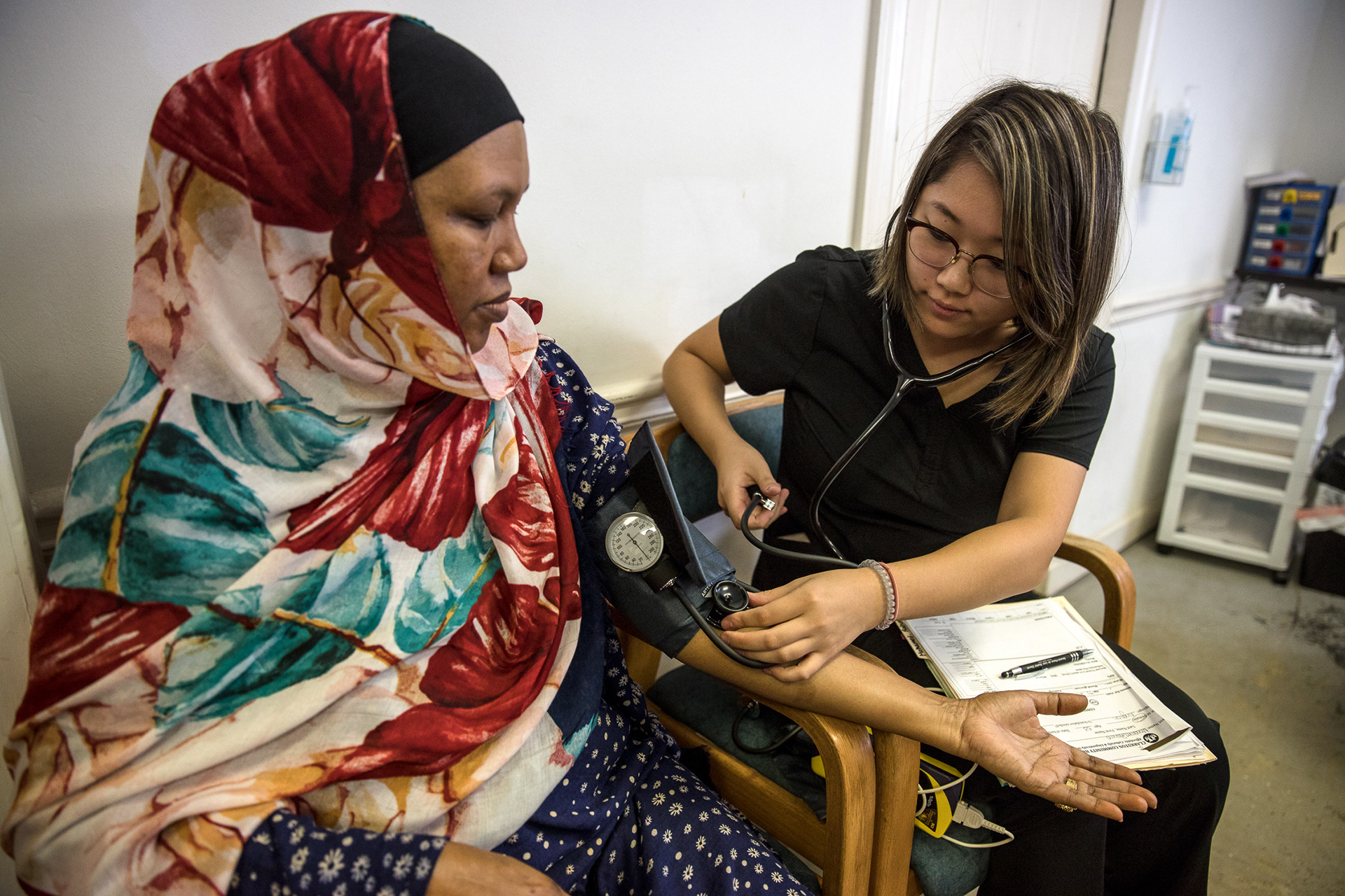 Rahma Mohamed, 53, has her vitals checked before seeing the doctor at the Clarkston Community Health Center on Sept. 22 in Clarkston.