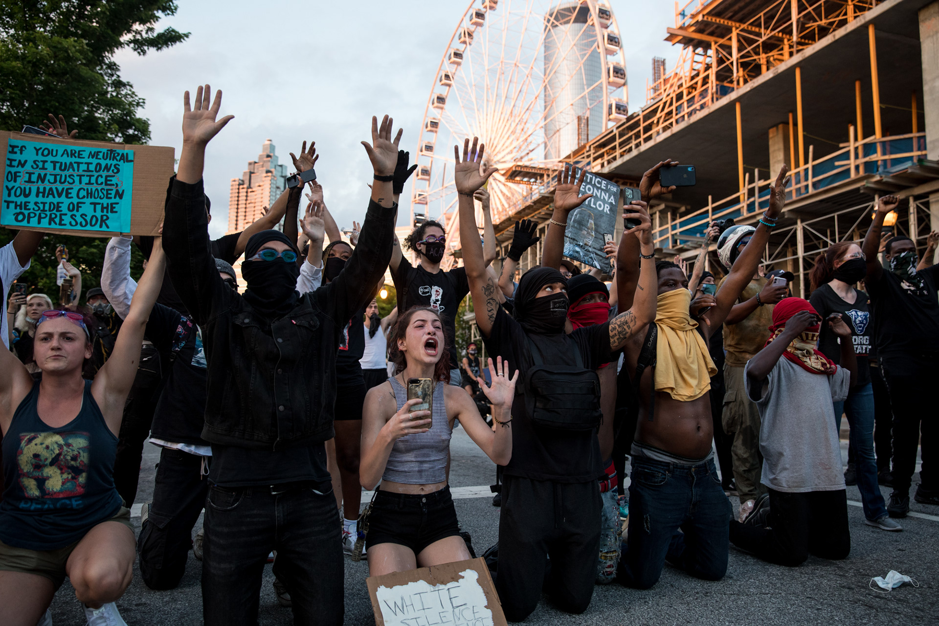 Protesters hold up their hands in front of law enforcement in downtown Atlanta on May 31.