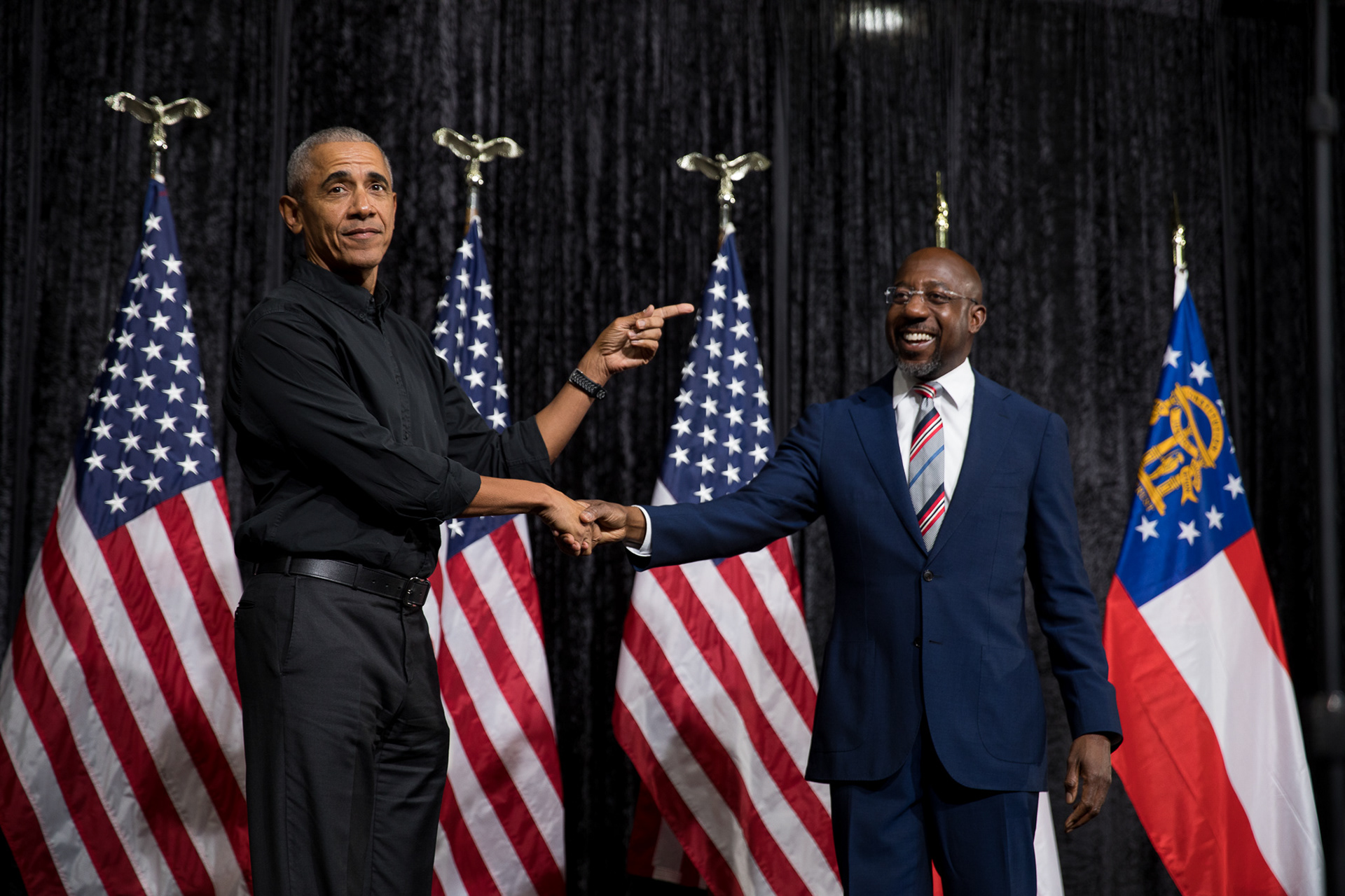 Former President Barack Obama campaigns for Georgia Senator Raphael Warnock in Atlanta on Dec. 1 2022, ahead of Georgia's senate runoff. Warnock faced Republican Football icon Herschel Walker, who was endorsed by Former President Donald Trump