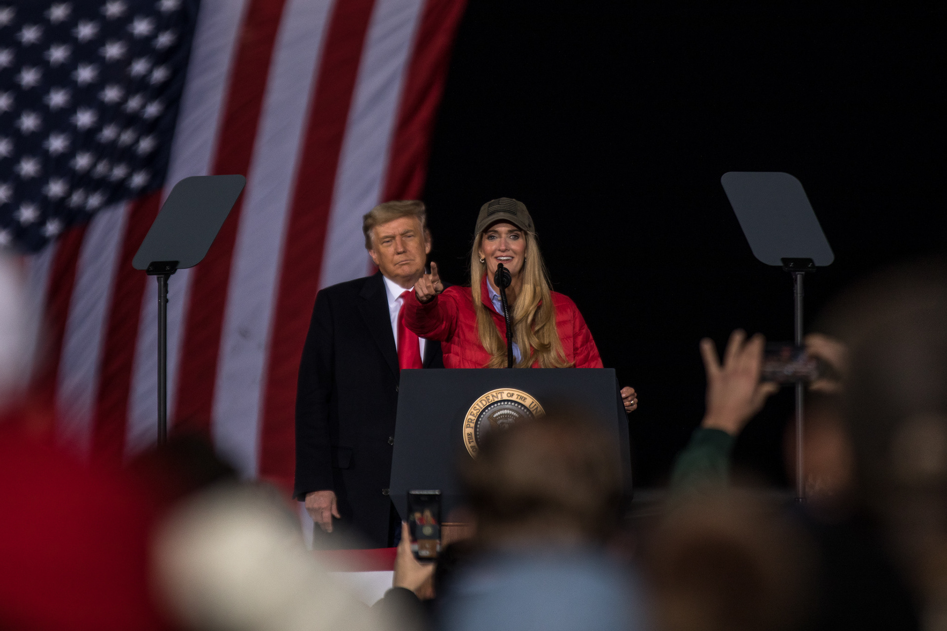 President Donald Trump watches as Sen. Kelly Loeffler announces she will challenge the electoral college vote at ta rally in Dalton.
