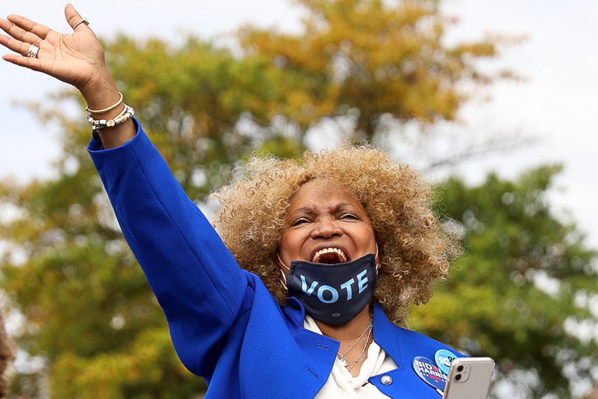 An attendee cheers as Dr. Jill Biden speaks at a rally for her husband, Joe Biden, in Decatur on Oct. 12.