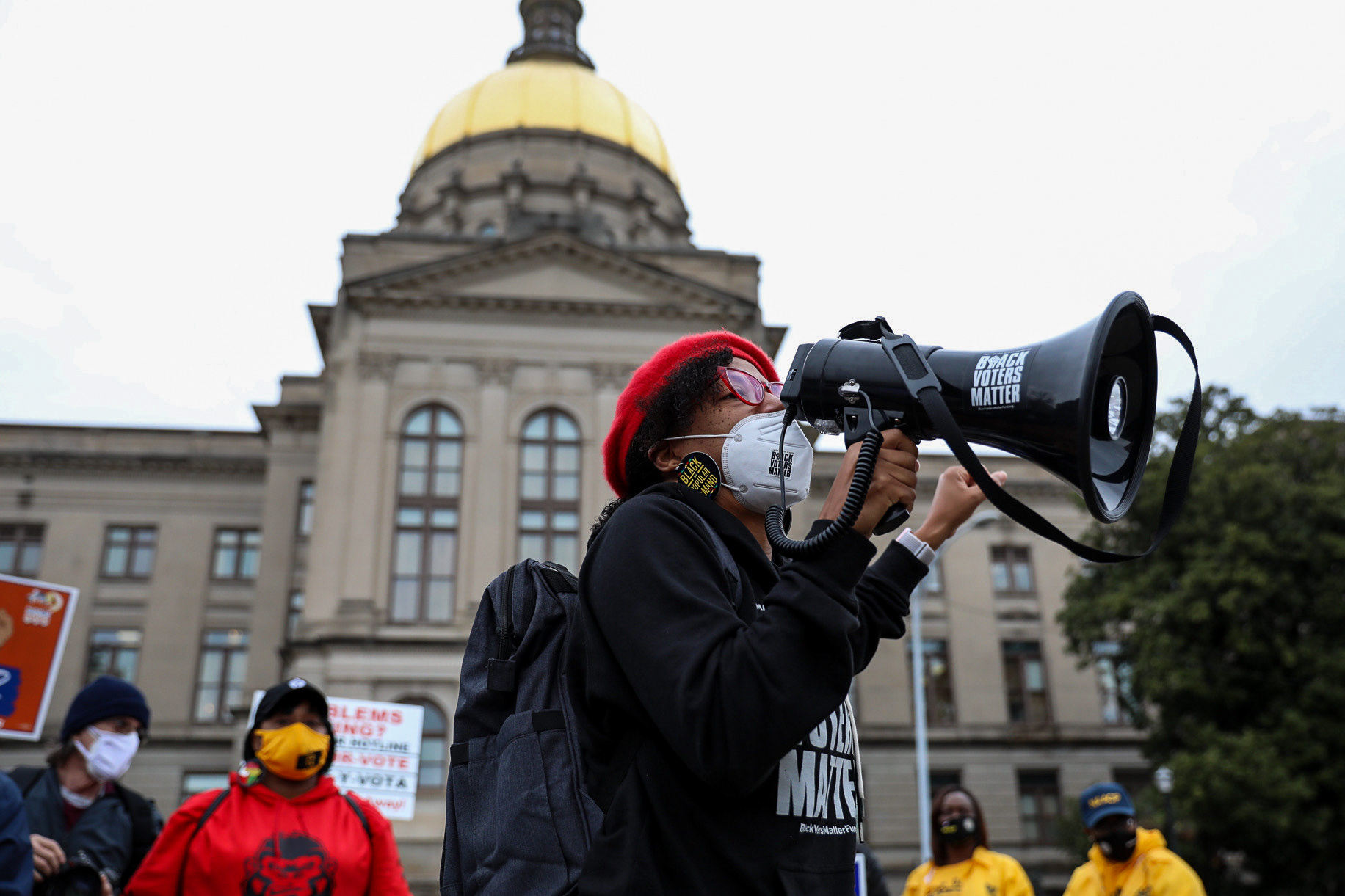 Protesters speak out against restrictive voting measures pushed by GOP state lawmakers in the wake of the 2020 election.
