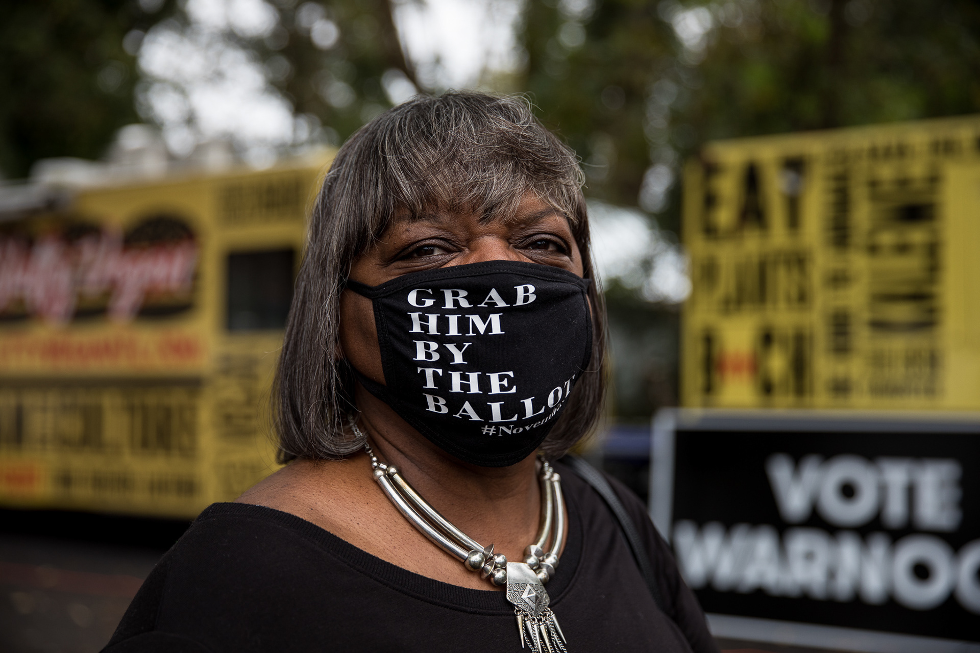 Rowena Conley from Fayetteville joins Democratic supporters for a rally in Jonesboro for U.S. Senate hopefuls Jon Ossoff and Rev. Raphael Warnock.