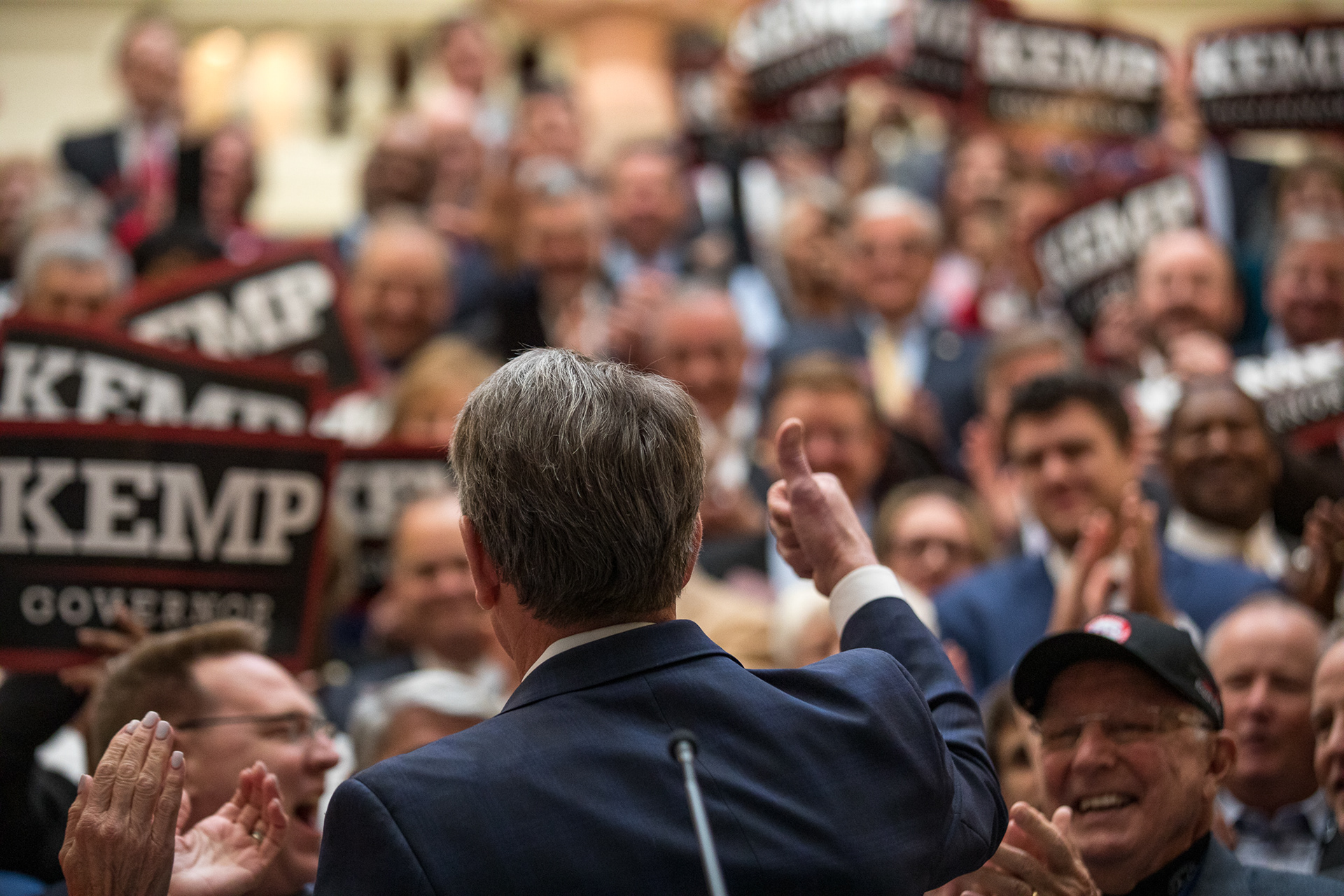 Gov. Brian Kemp rallies with supporters at the Georgia State Capitol after officially qualifying for his reelection campaign.