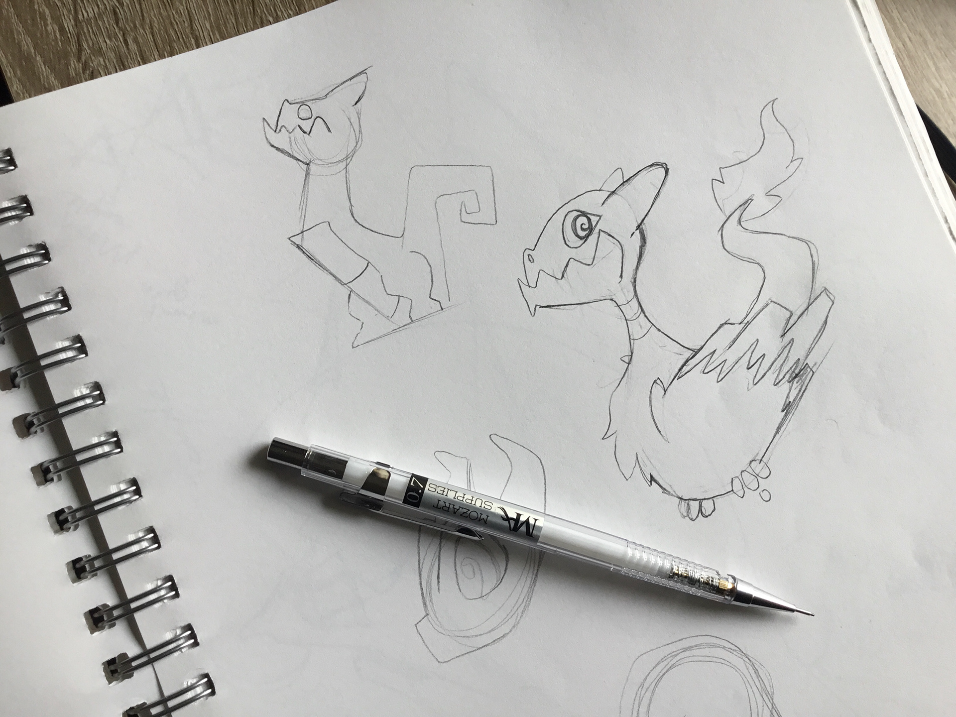 More feathery dragon designs