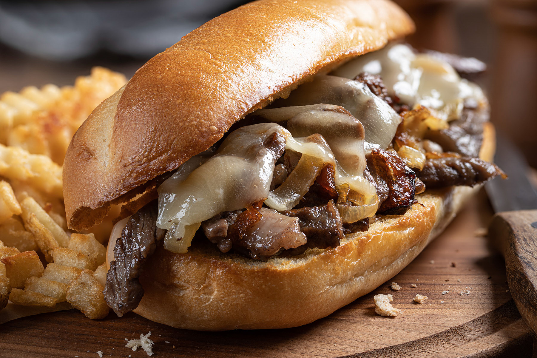 Philly cheesesteak on a toasted hoagie roll
