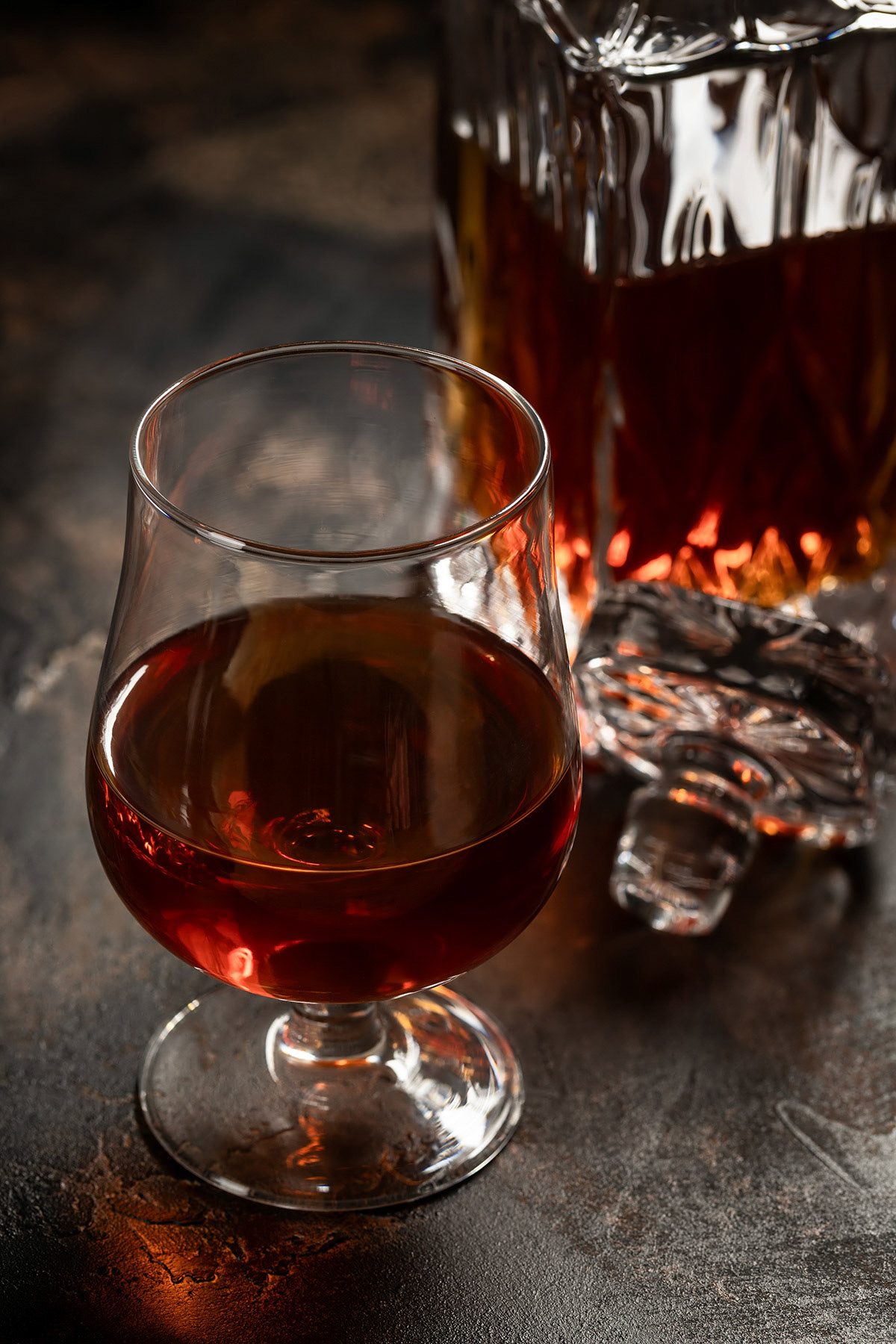 Snifter of brandy and decanter