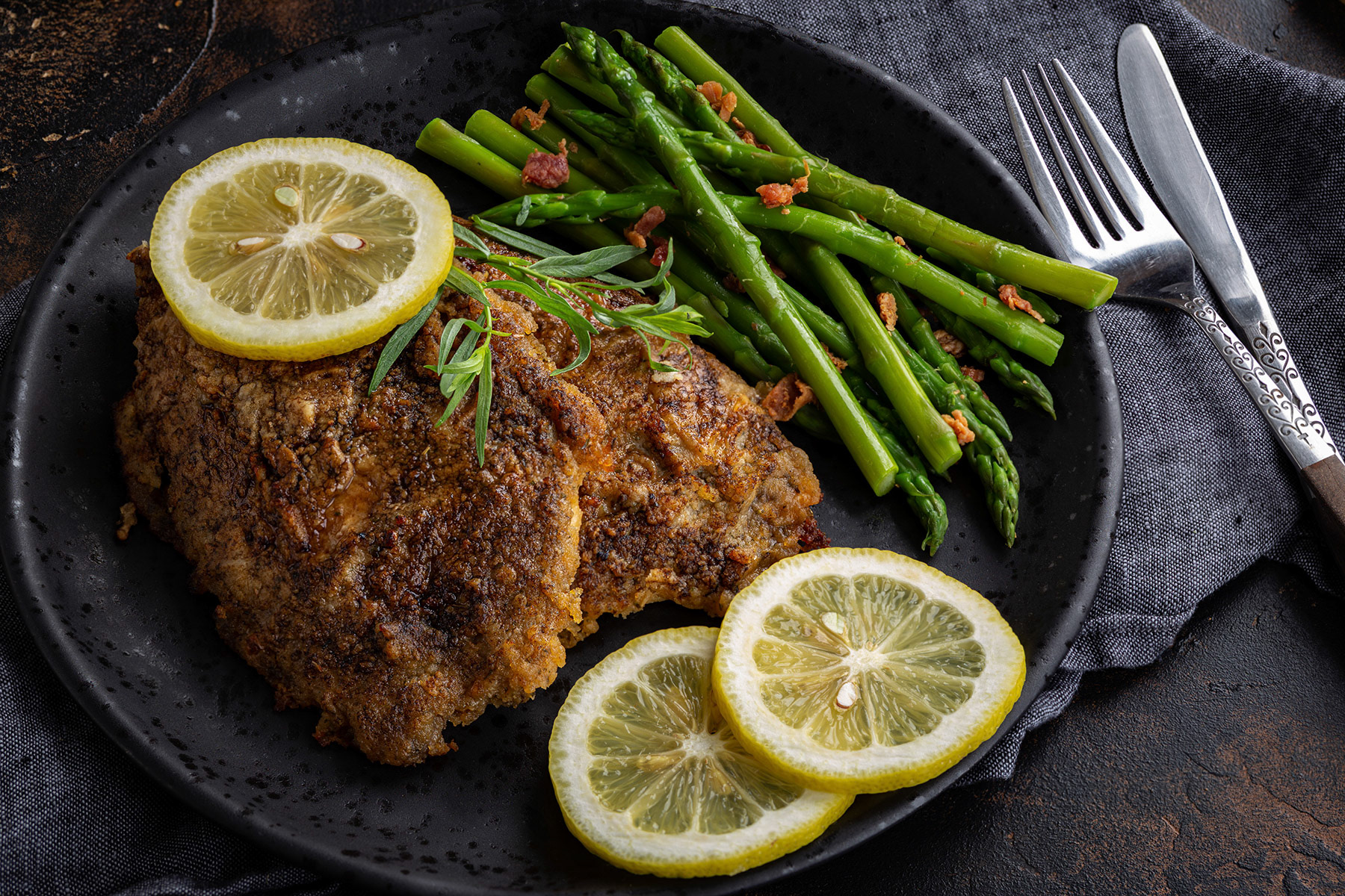 Baked tilapia fish fillets with lemon slices