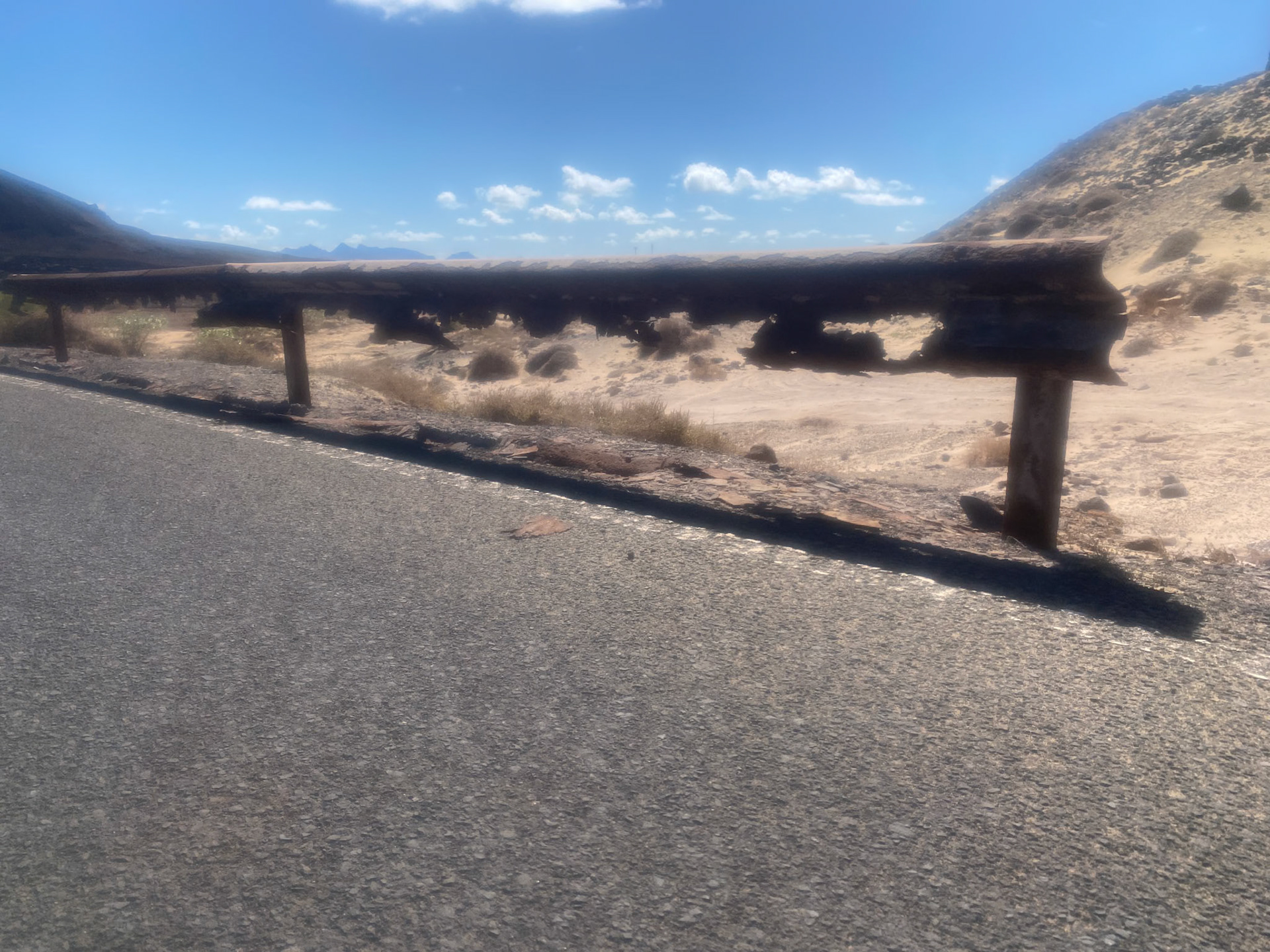 Exposed to the sea air, the crash barrier corrodes.