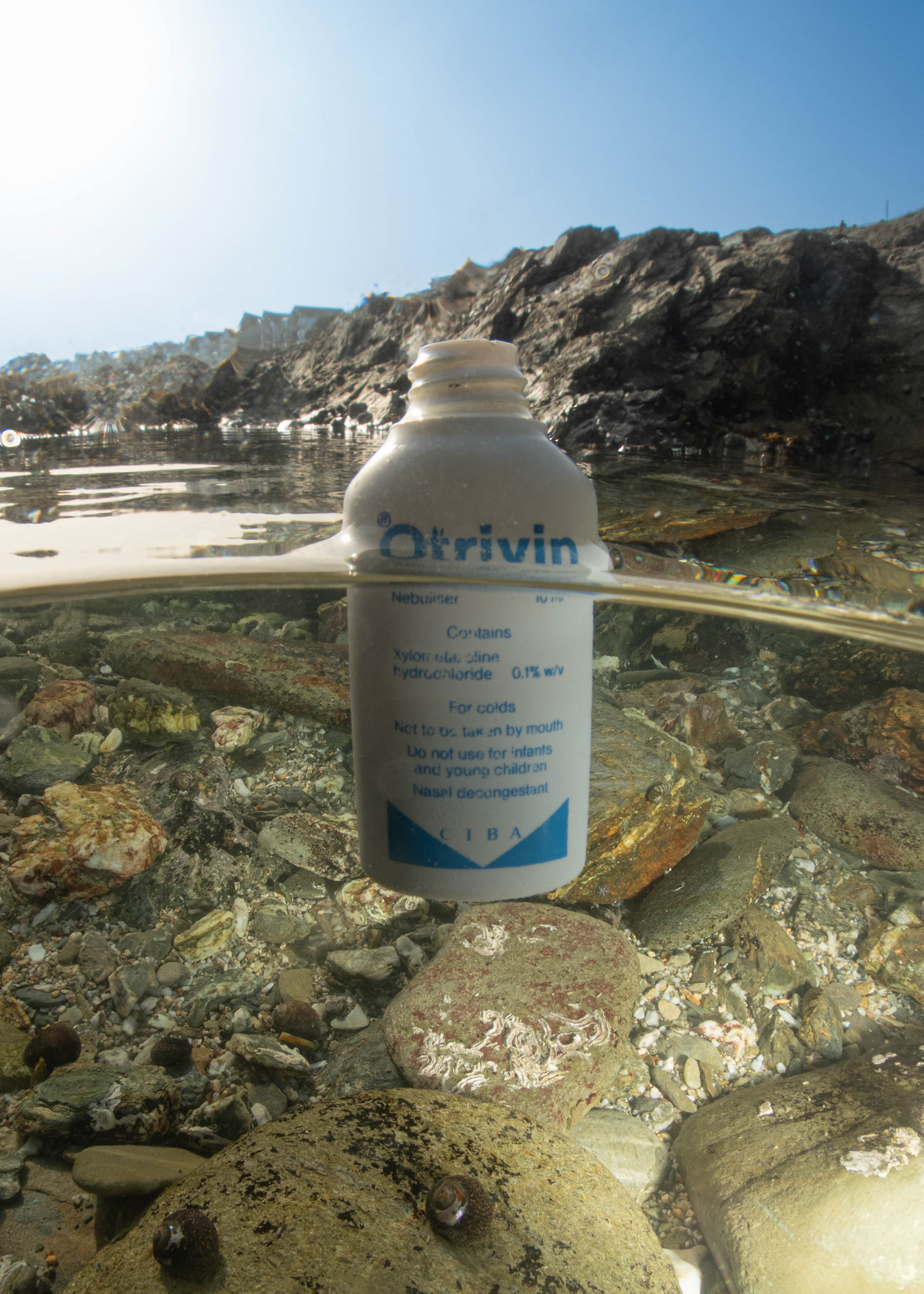 My project exposes the issue of global shipping, specifically container ship spills. This image is the establishing shot. I used a wide-angle converter on the Canon G9x to get a split-level photograph of life beneath the water.