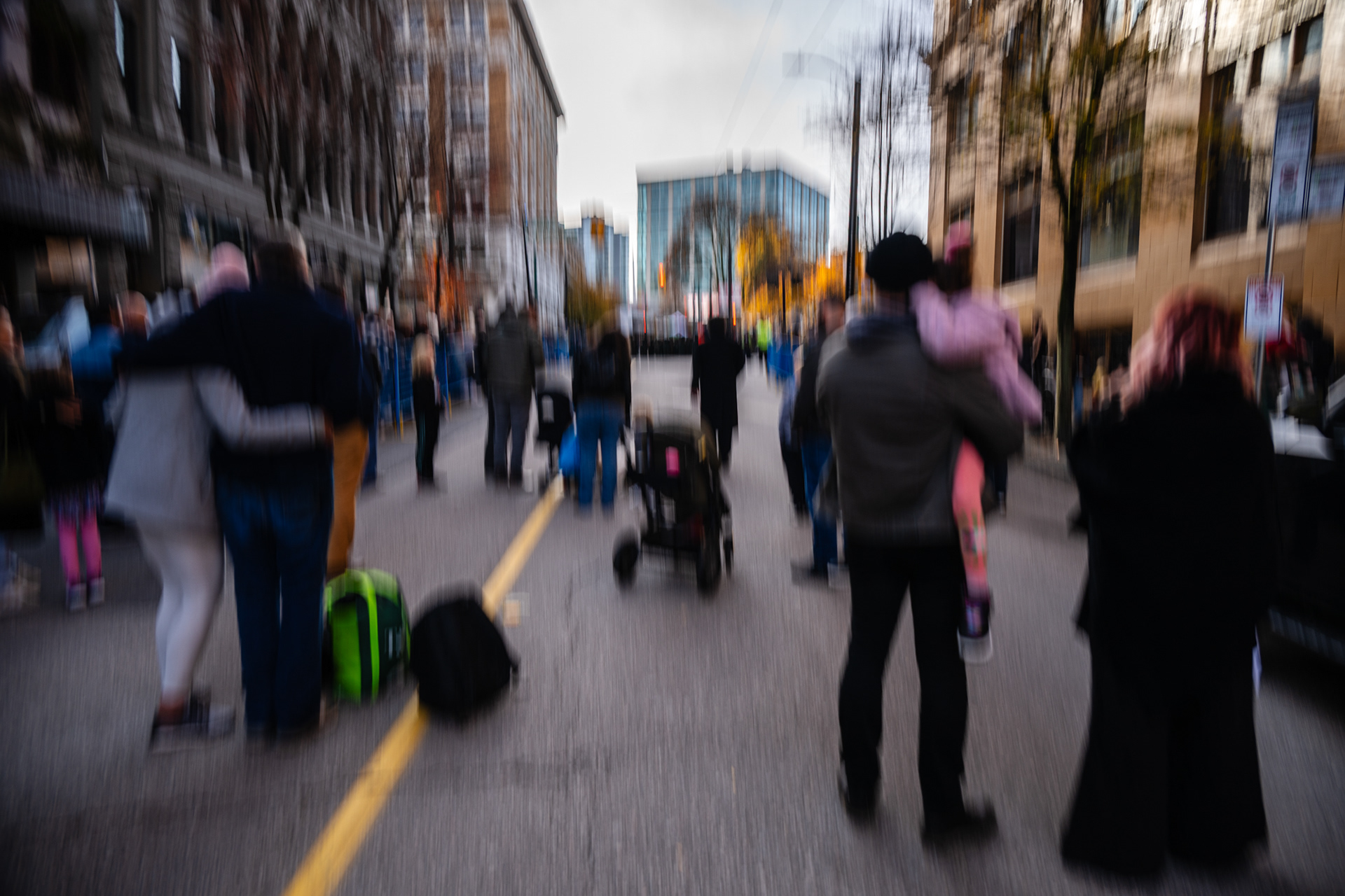 With our backs to the future we stand in the street; remembering the ones we lost