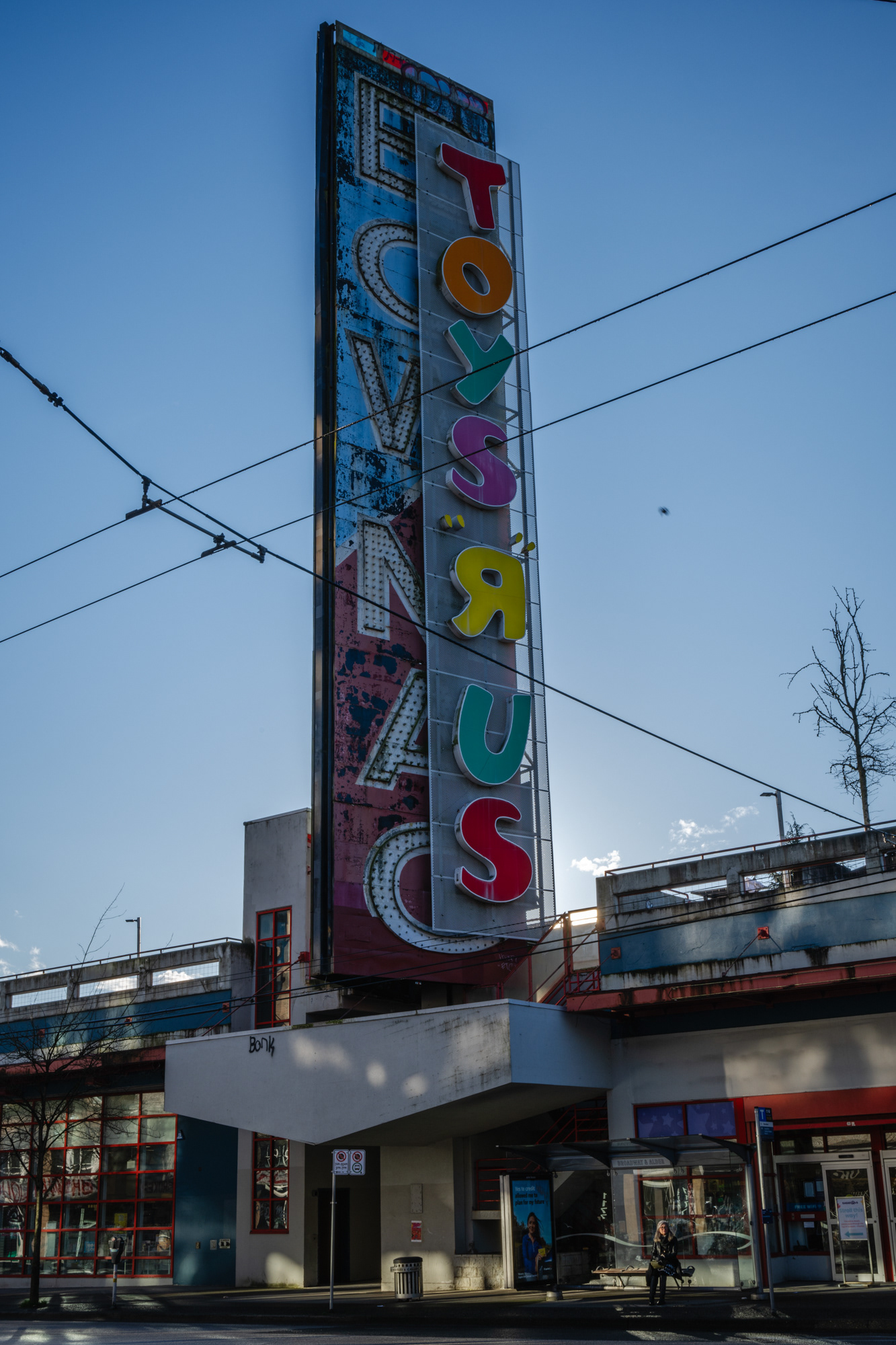 waiting for transit on Broadway, Vancouver 2025