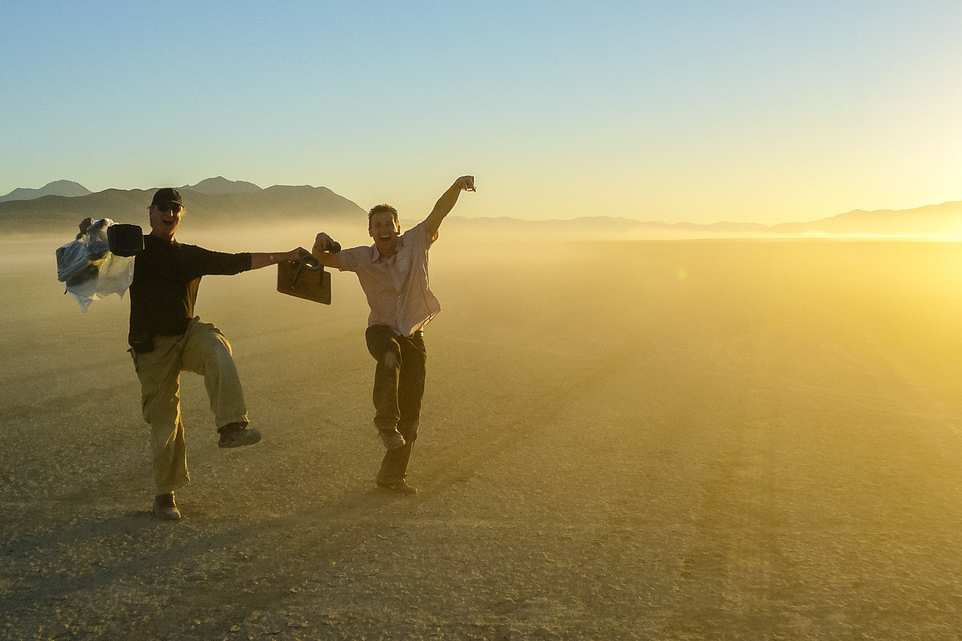 Project X. Larry Lynn & Mitch Gabourie dancing on the playa, Black Rock Desert, Nevada 2007