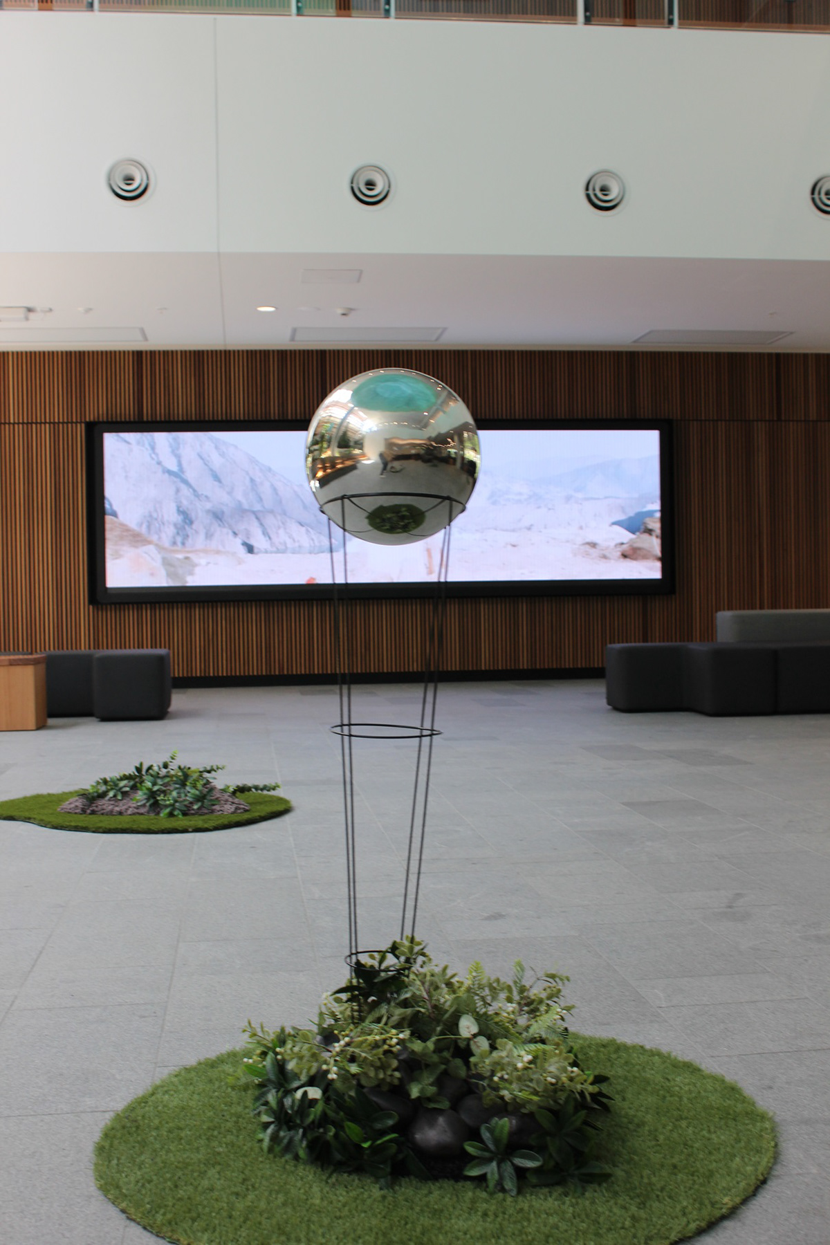 (2022). Proxy-Sphere and the Sphere alter, The Mirror Sphere. [Wire, spherical ball, stones]. Installation view.
