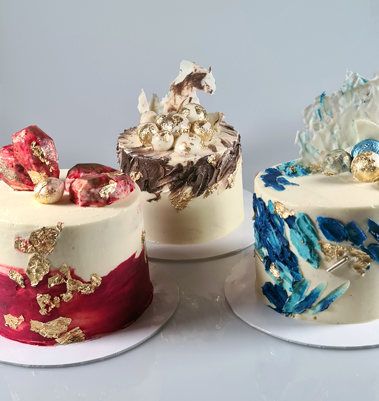Vanilla cakes with hand made edible toppers