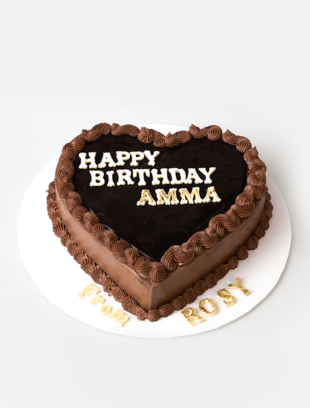 Chocolate cake topped off with dark chocolate ganache