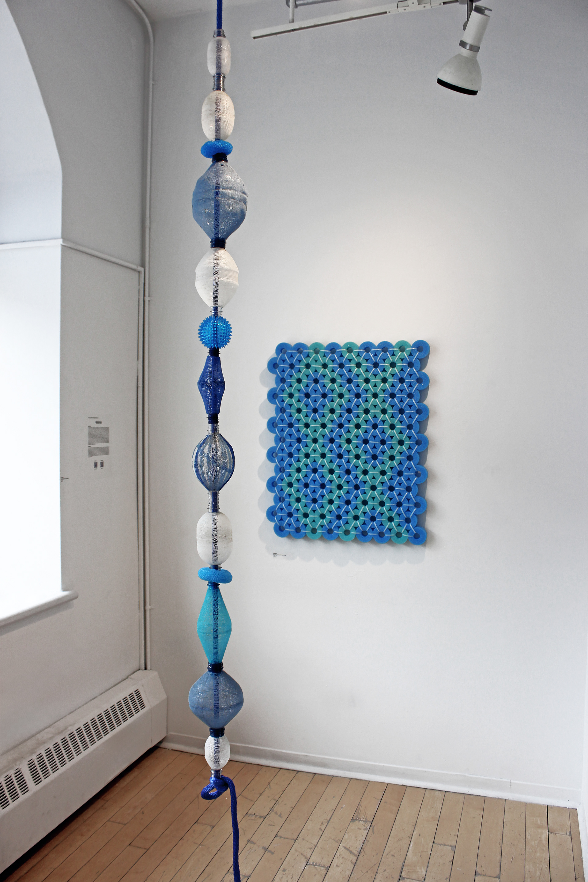 Havya, Upcycled Plastic Assemblage, 6x77 inch