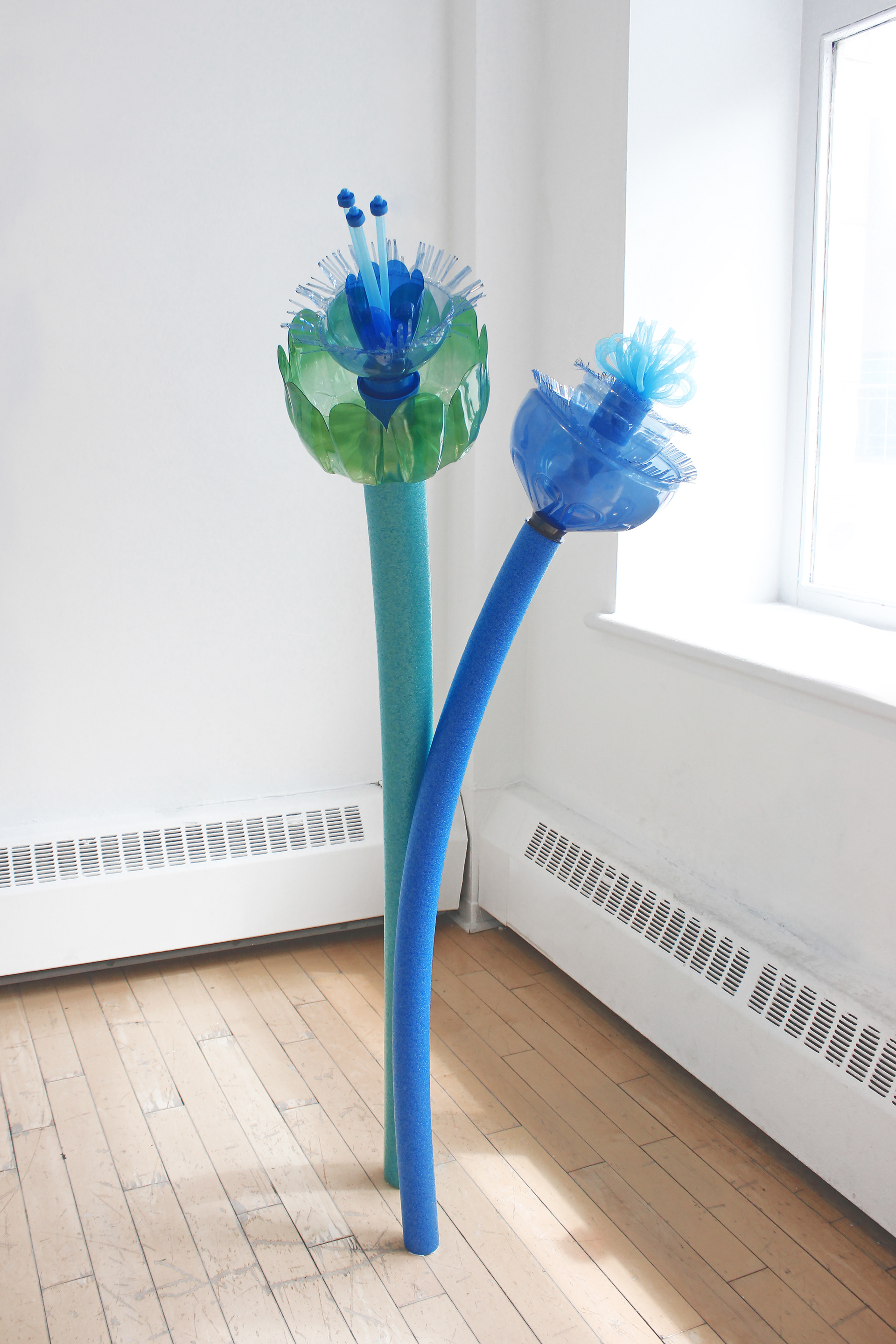 Blossoms I Gathered, Upcycled Plastic Assemblage, 23×62.5 inches