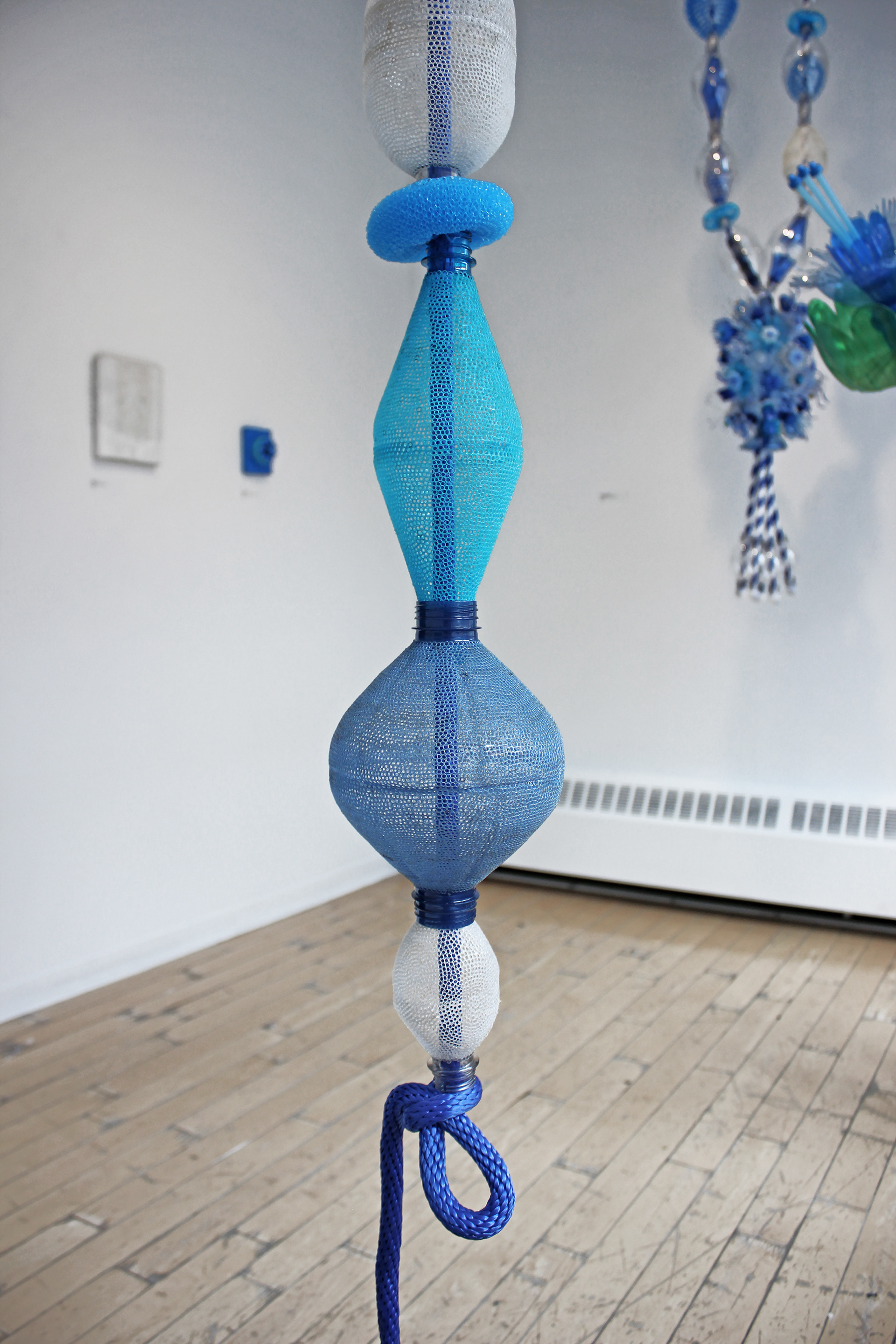 Havya, Upcycled Plastic Assemblage, 6x77 inch