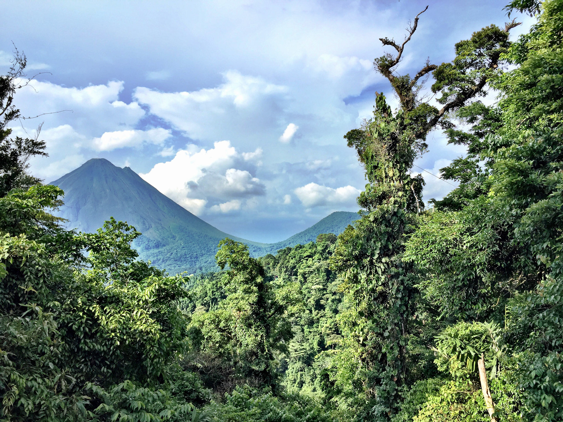 Arenal II | Arenal Volcano near La Fortuna is the youngest and most active of all volcanoes in Costa Rica. It's been considered eruptive since 1968 but has been asleep since 2010. Arenal formed more than 7,000 years ago and reaches 5,437 feet into the sky.