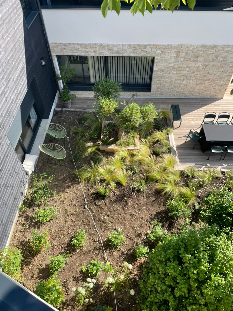 Rooftop garden on parking slab — naturalistic planting, Meudon