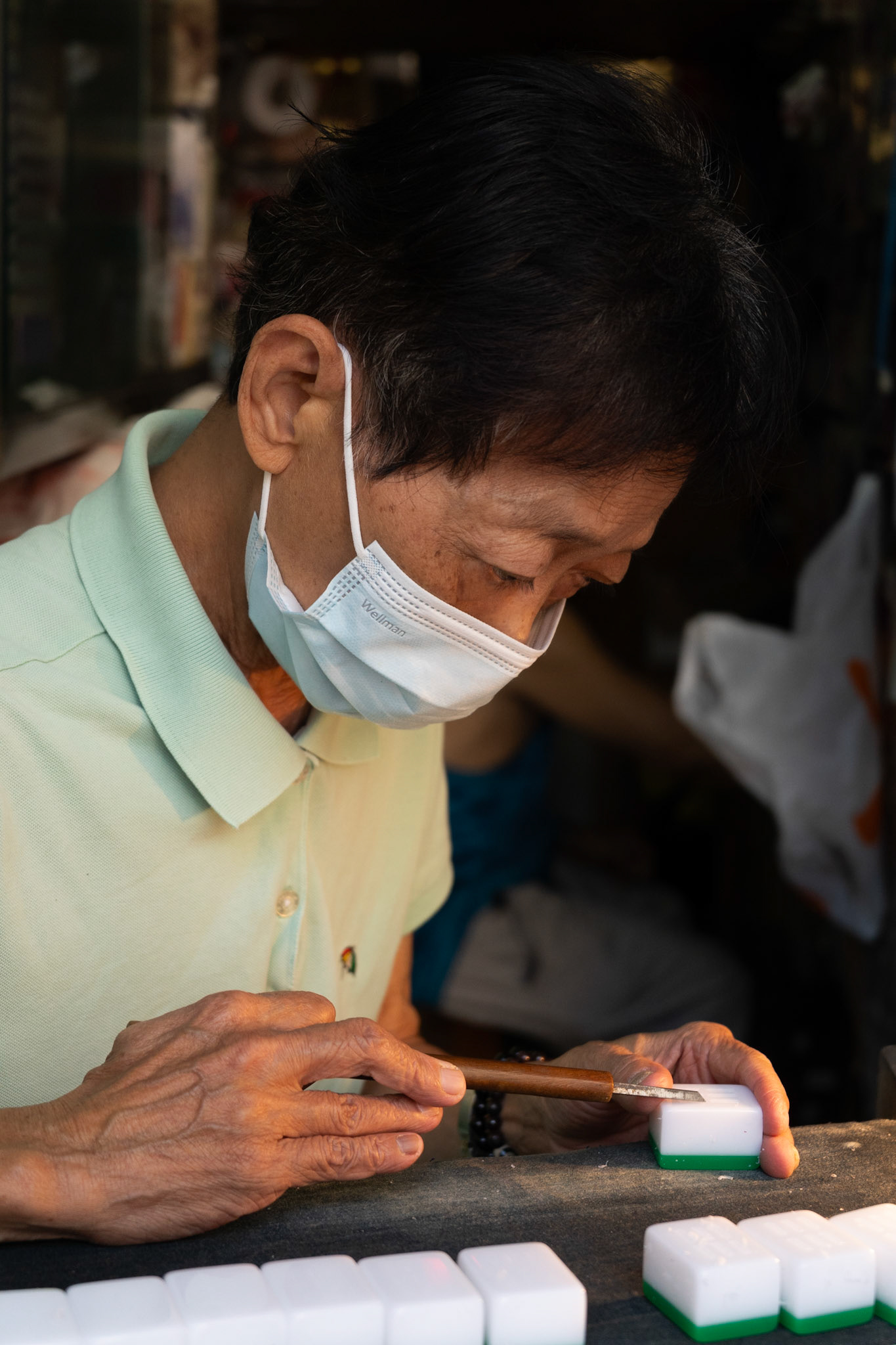 Ho Sau-Mei carving pieces at Kam Fat Mahjong