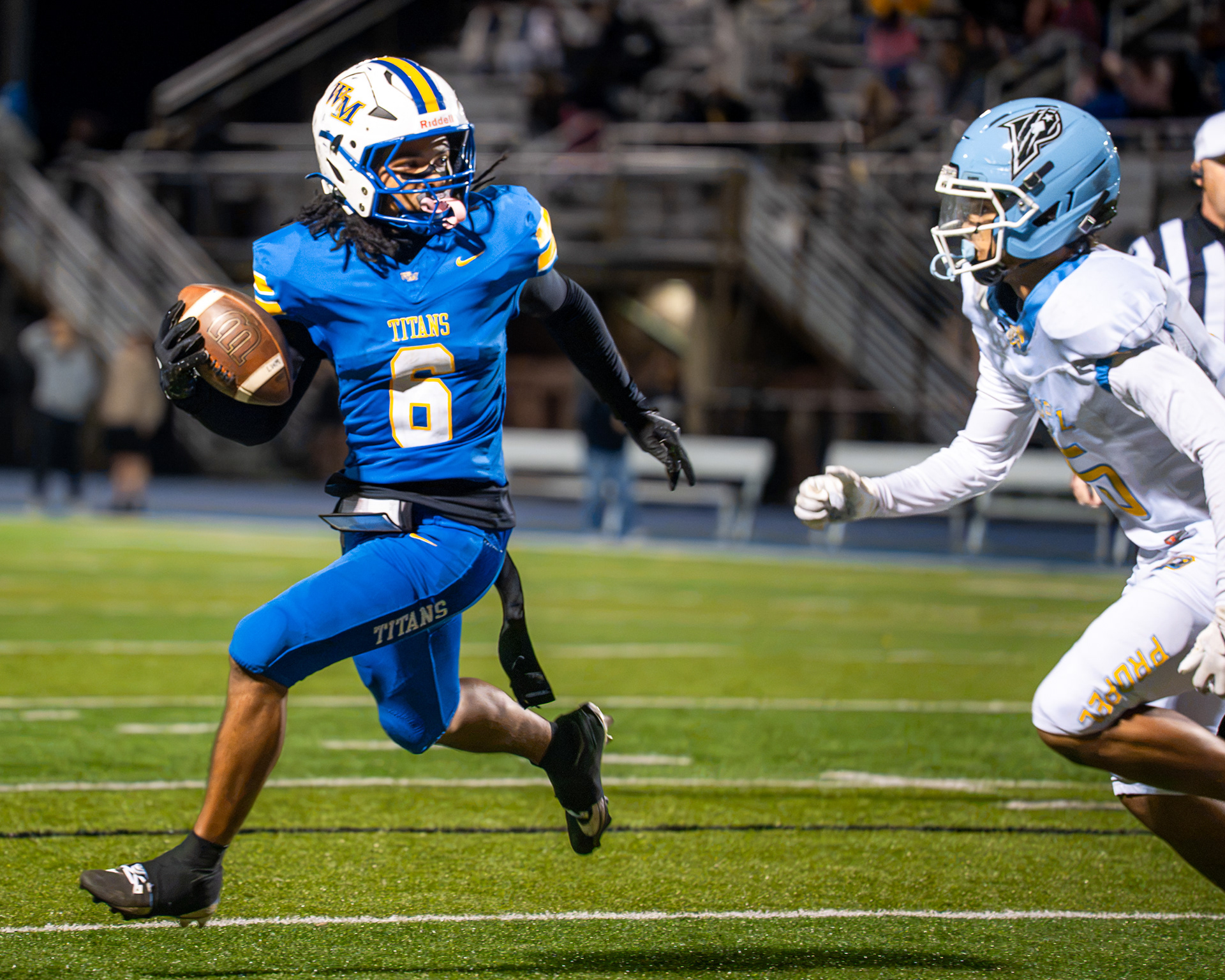 West Mifflin's Armand Hill (6) carries the ball while being pursued by a Propel Braddock Hills defender Junior Victor Starr (5) on Friday, Oct. 9, 2026, at West Mifflin Area High School.