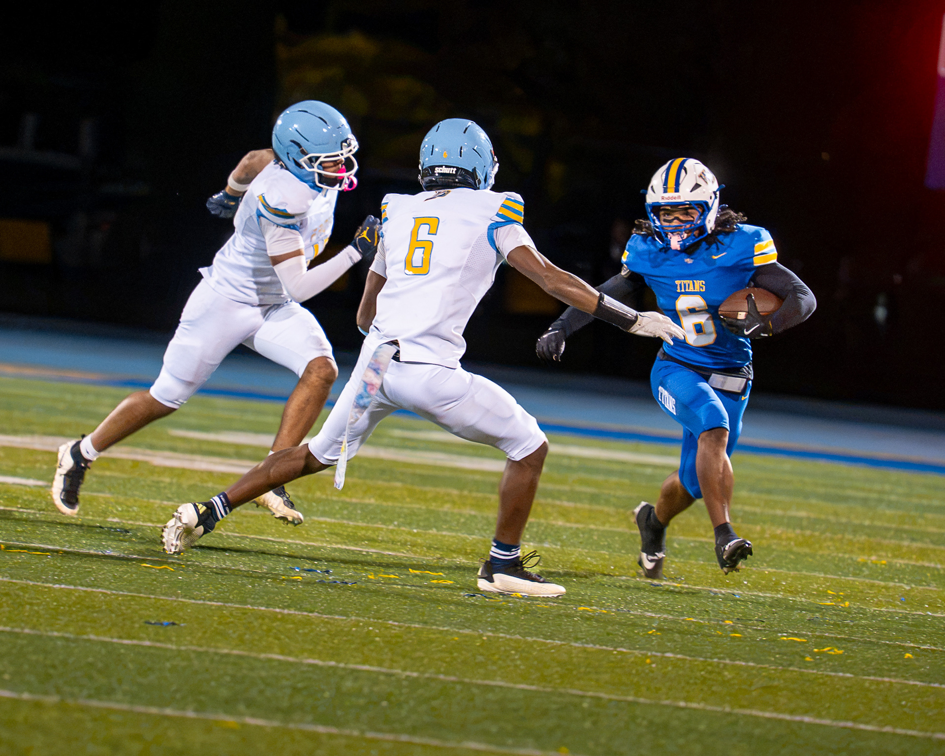 West Mifflin's Armand Hill (6) carries the ball as Propel Braddock Hills defenders close in during a game Friday, Oct. 9, 2026, at West Mifflin Area High School.
