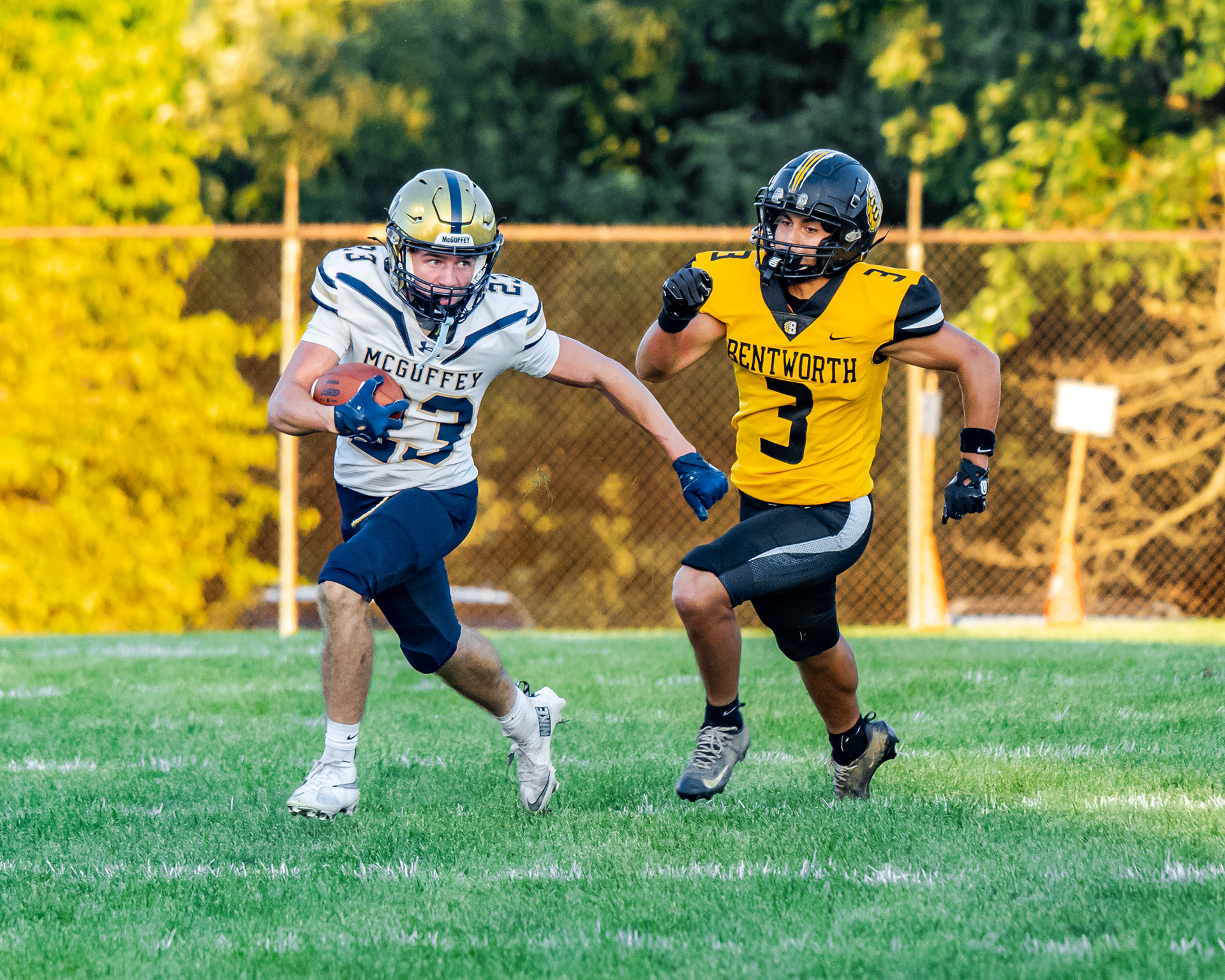 McGuffey's Dristen McAnallen (23) carries the ball as Bentworth's Noah Leichty (3) pursues during a game Friday, Aug. 28, 2026, at Ellsworth Athletic Field in Bentleyville, Pa.