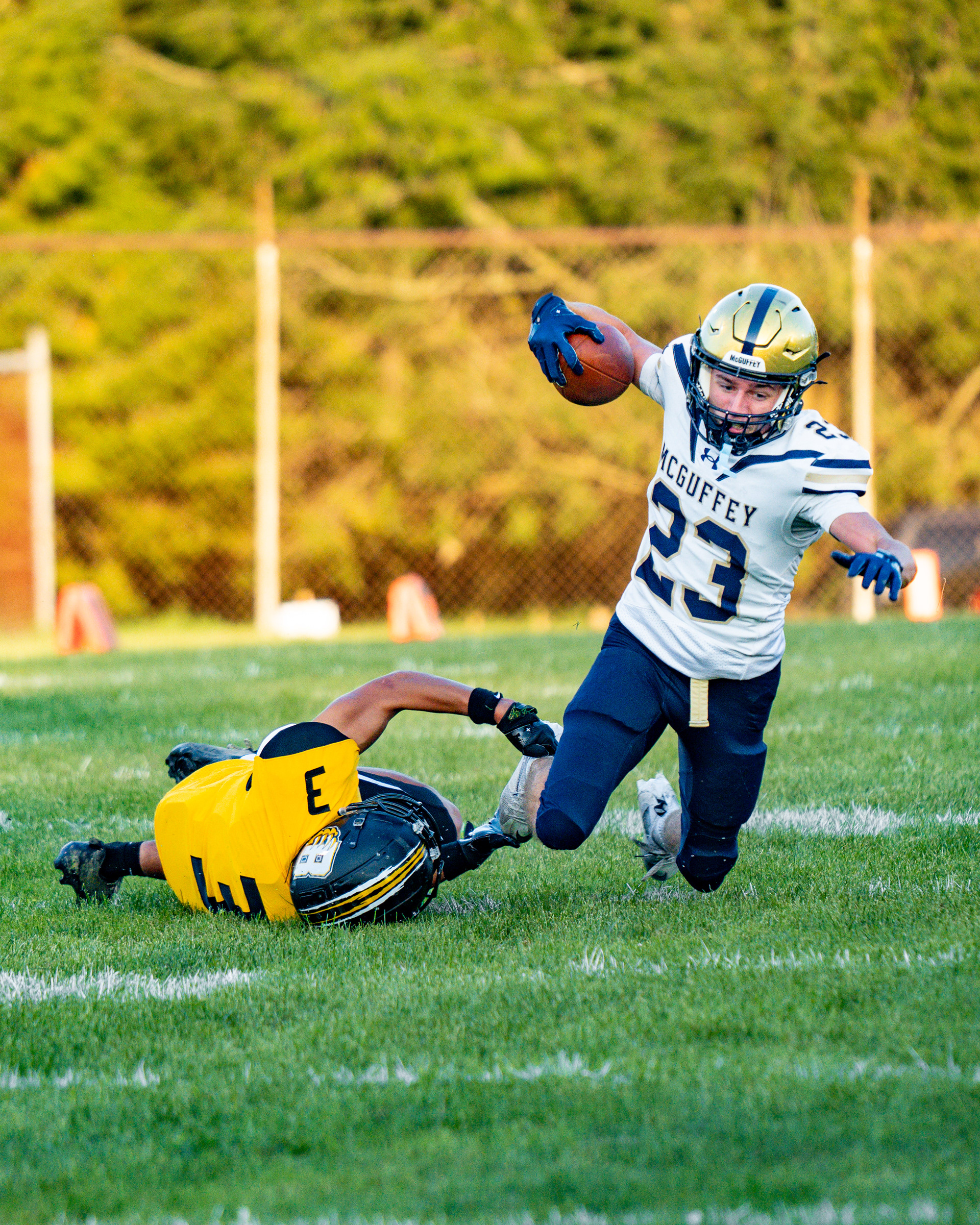 McGuffey's Dristen McAnallen (23) evades a tackle attempt by Bentworth's Noah Leichty (3) during a game Friday, Aug. 28, 2026, at Ellsworth Athletic Field in Bentleyville, Pa.