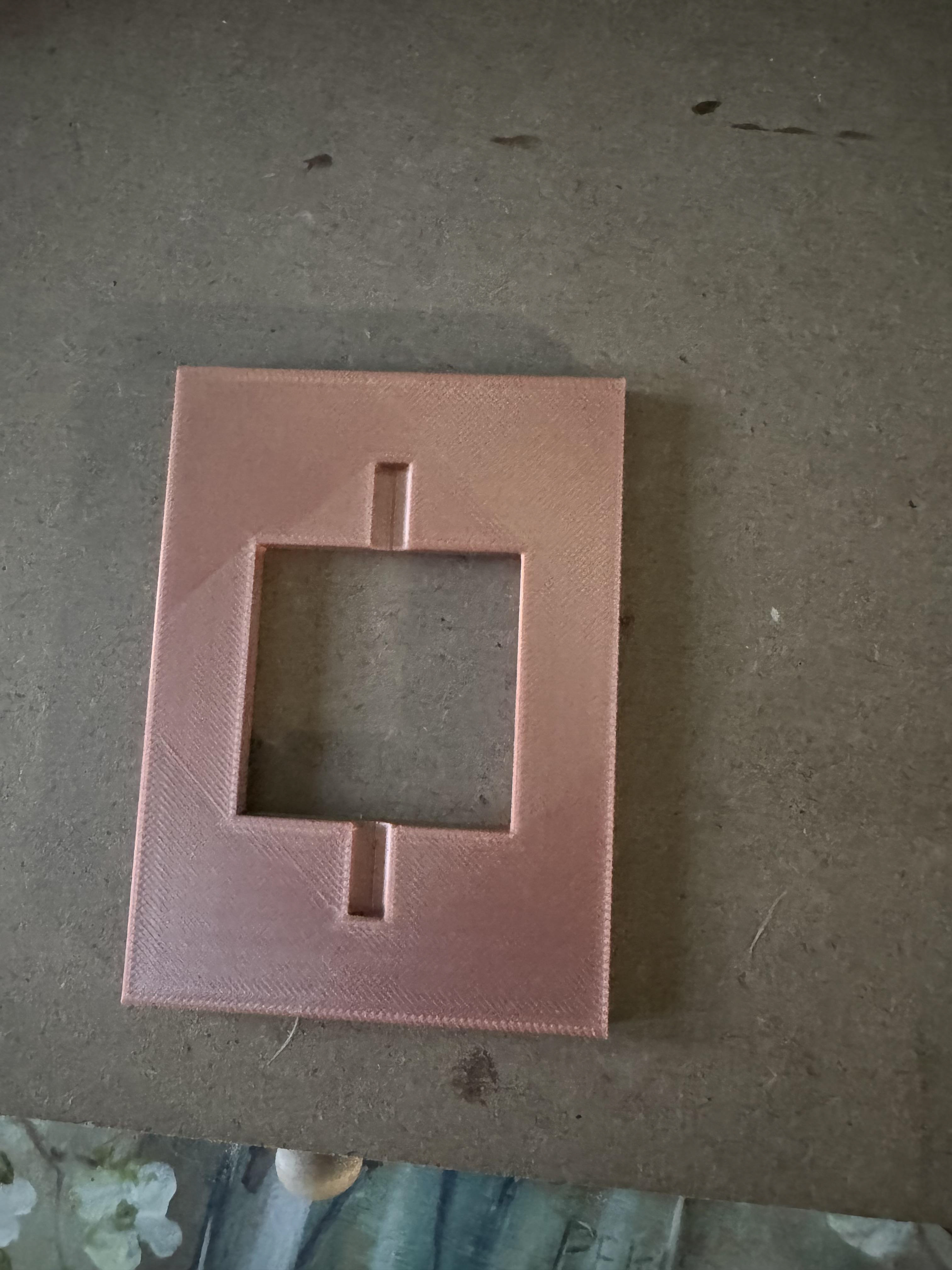 1 Side of trading card half before assembly.