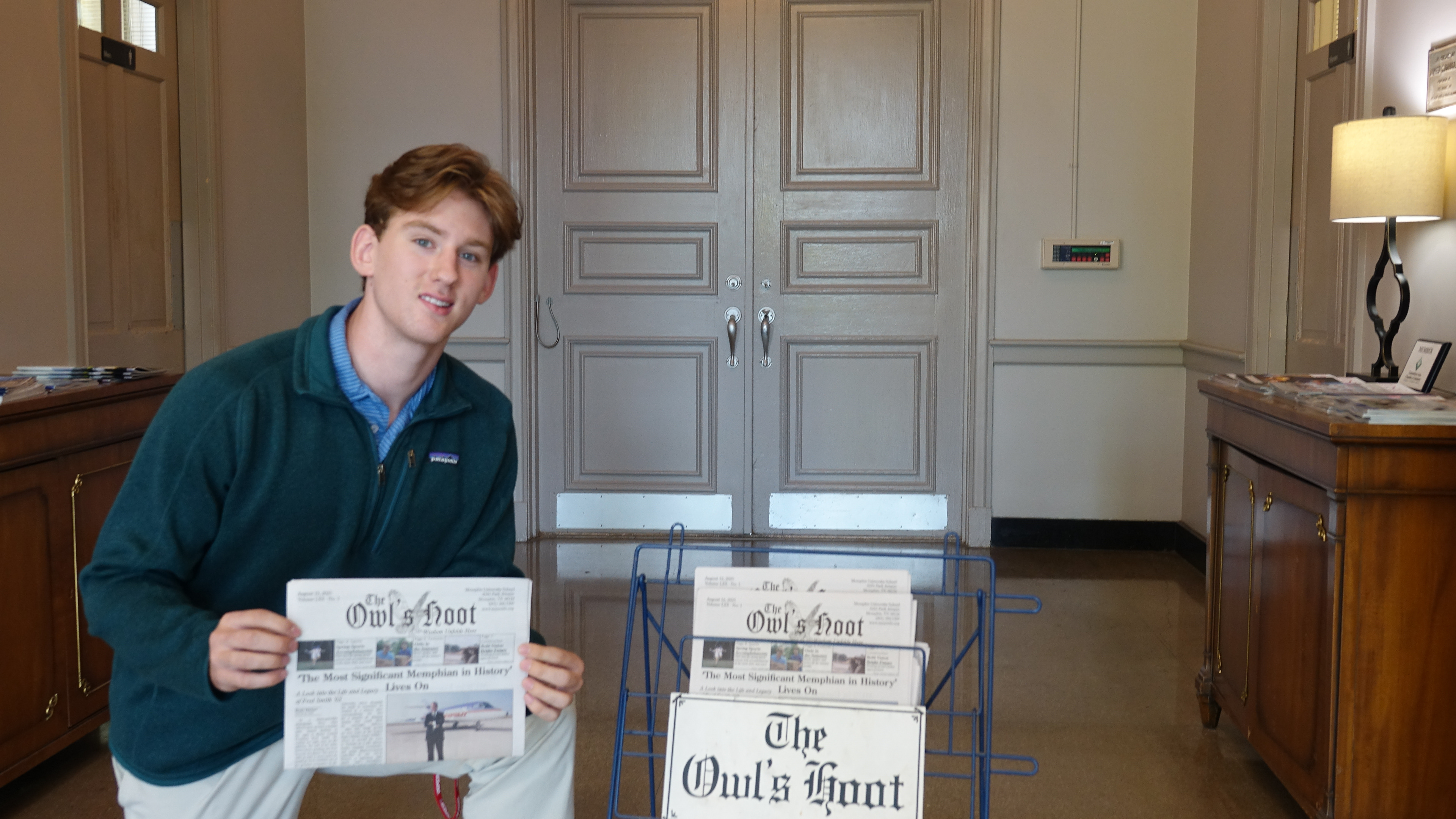 A photo of me posing with our back to school edition, taken for social media purposes by the MUS communications team. This design was quickly antiquated as we continued growing our paper! (Photo Courtesy of MUS Communications)