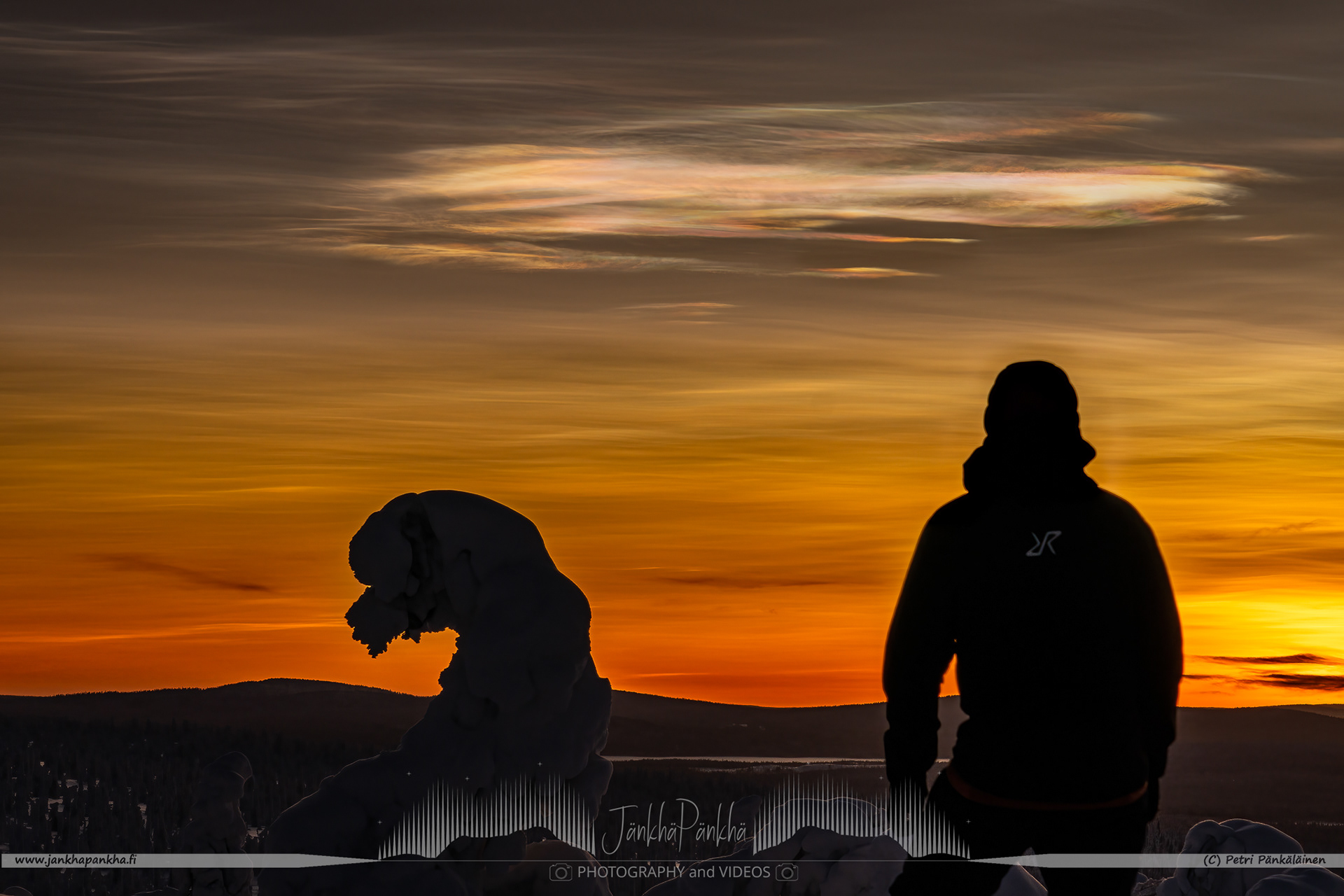 A silhuette of me standing at the front of beautiful sunset and  polar stratospheric clouds