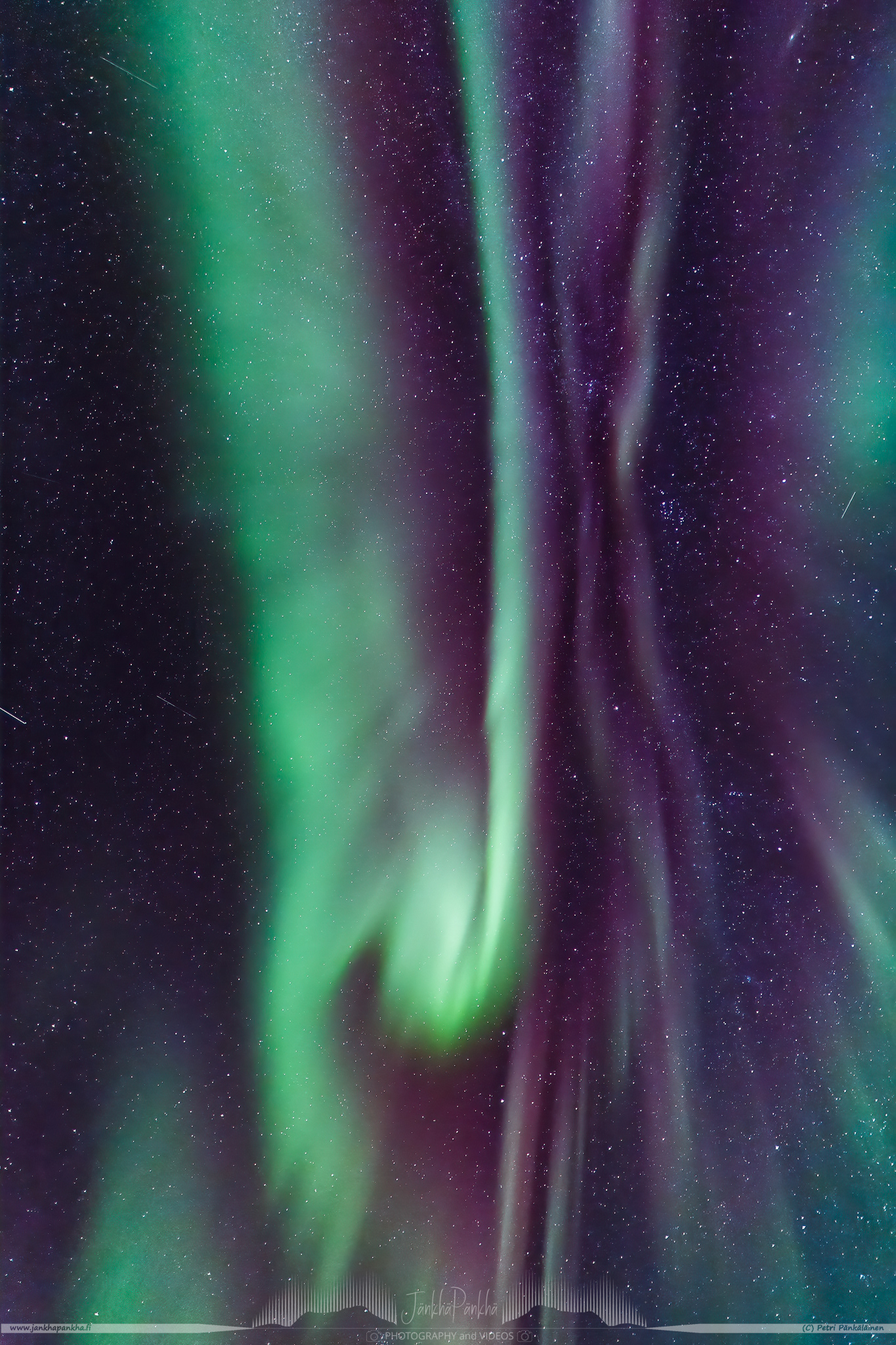 Full sky purple and green aurora borealis in Ylikyrö, Enontekiö, Finland