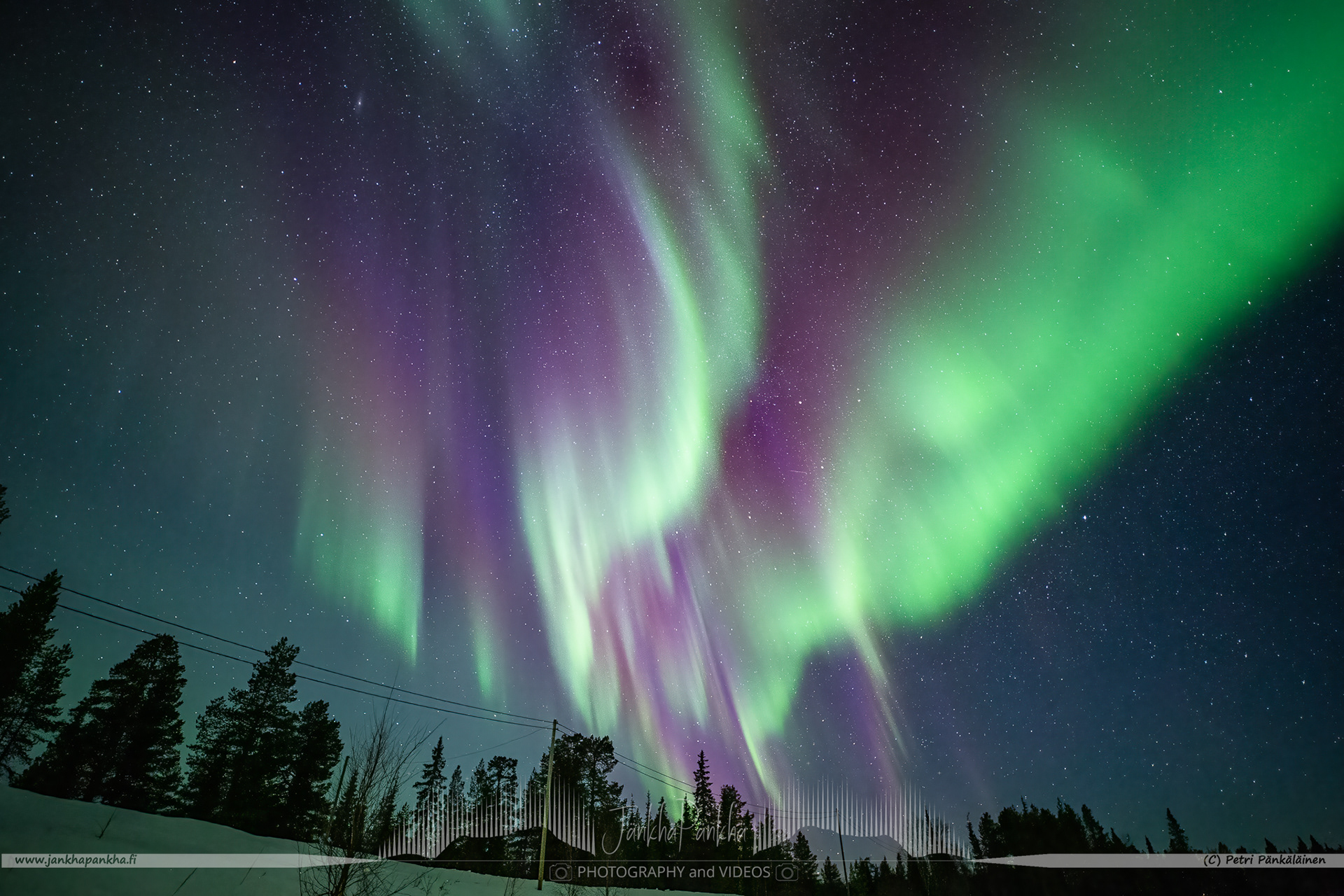 Full sky purple and green aurora borealis in Ylikyrö, Enontekiö, Finland