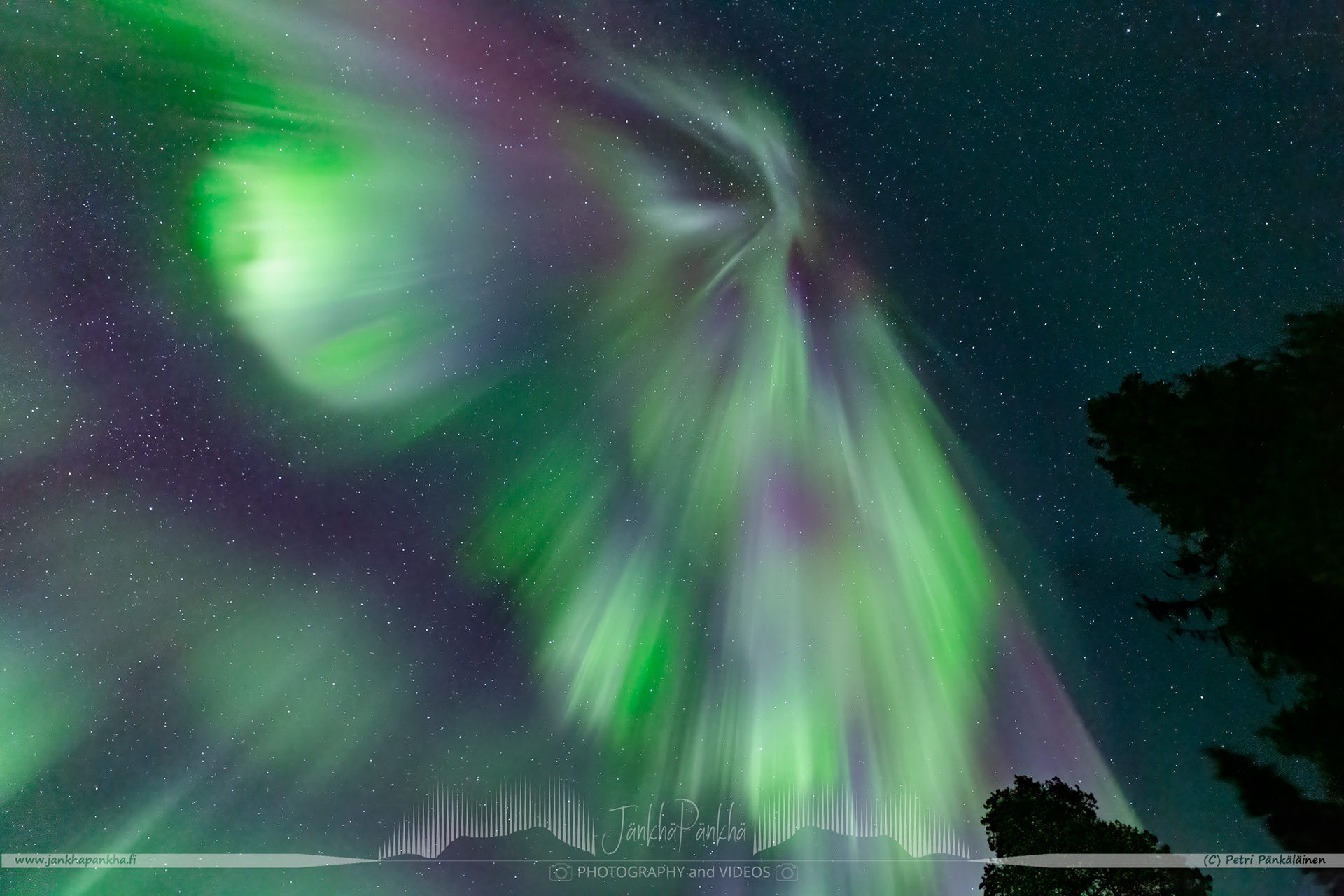 Full sky northern lights corona over the lake Pallasjärvi in Finland. The photo is from the Punainenhiekka hut. The  Punainenhiekka Day-use Hut is situated at the south end of Lake Pallasjärvi.