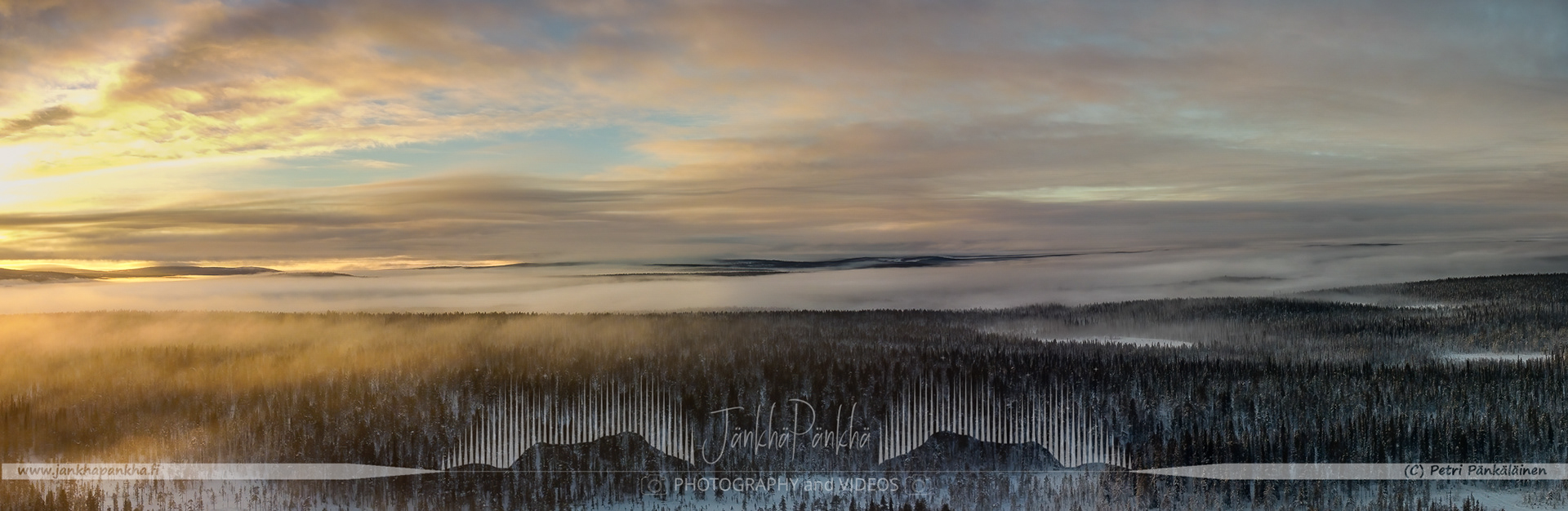 Vibrant orange and yellow hues painting the sky during autumn in Lapland's Pallas-Yllästunturi National Park.
